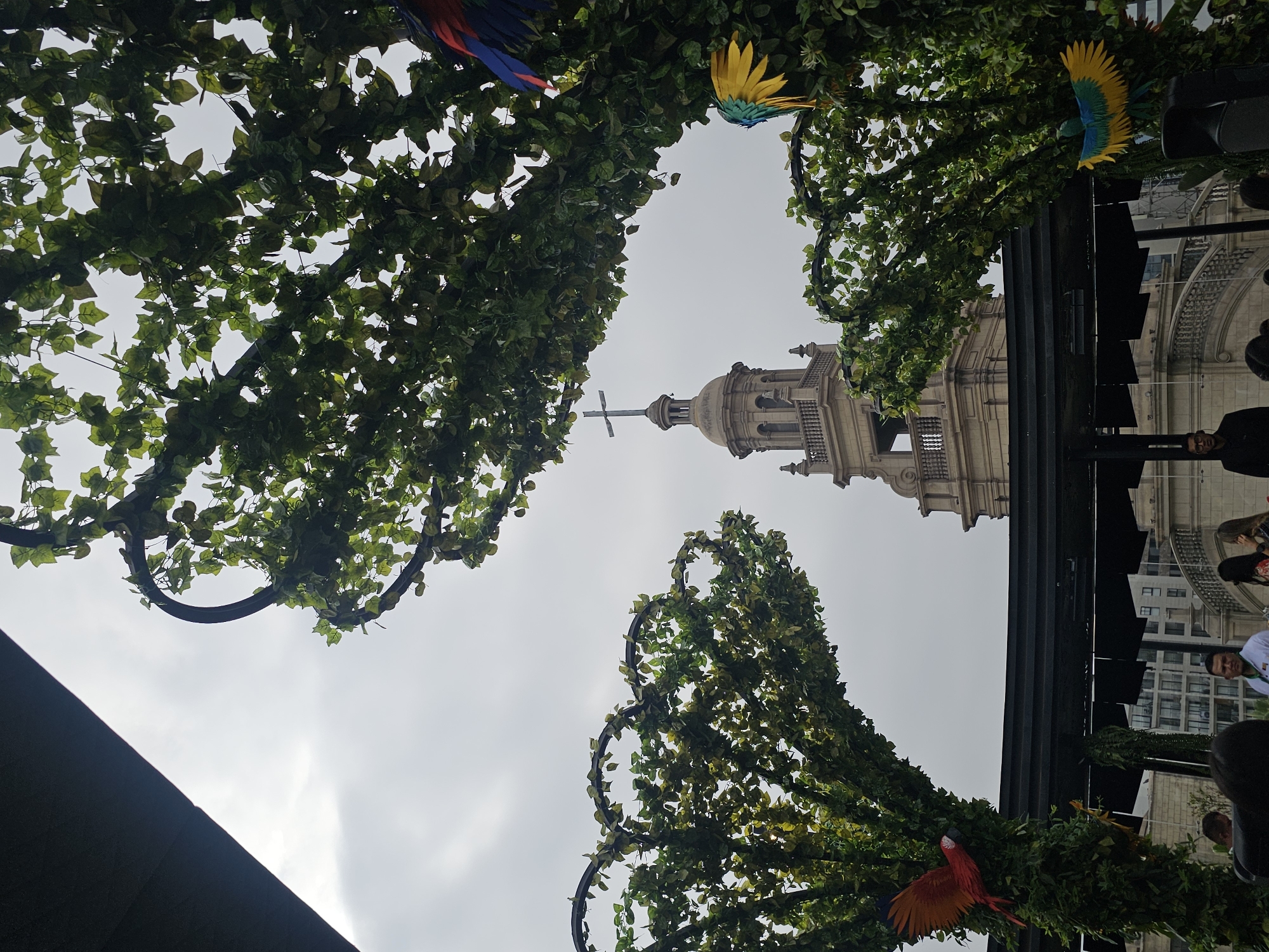 Rooftop dining view captures church tower in San Isidro