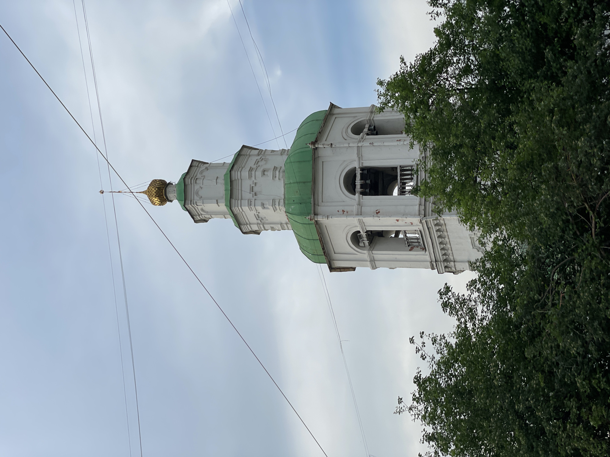 Food vendors operate near historic architecture in Krasnoyarsk