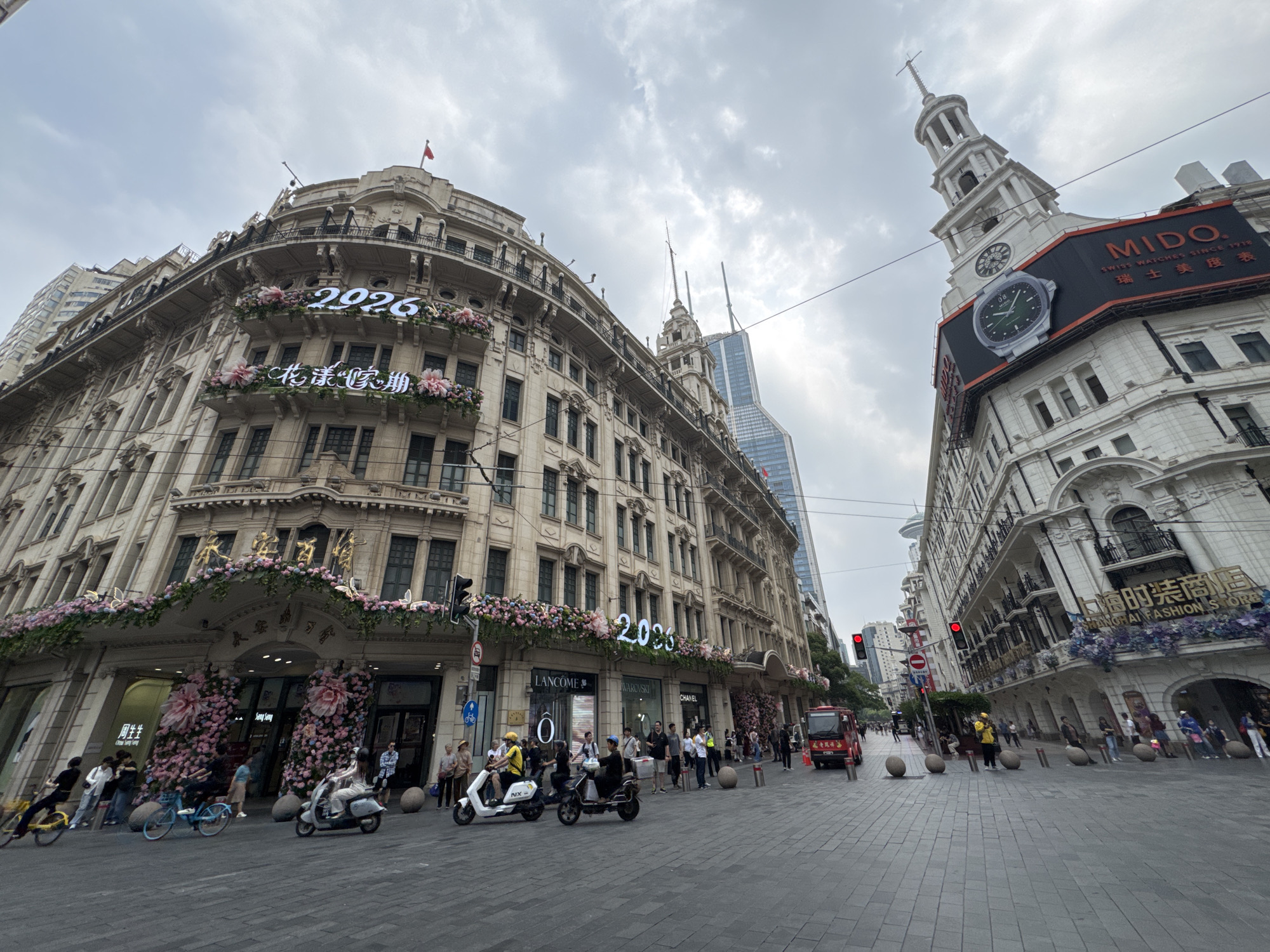 Shanghai street scenes documented showing mixed architecture, 2026 decorations