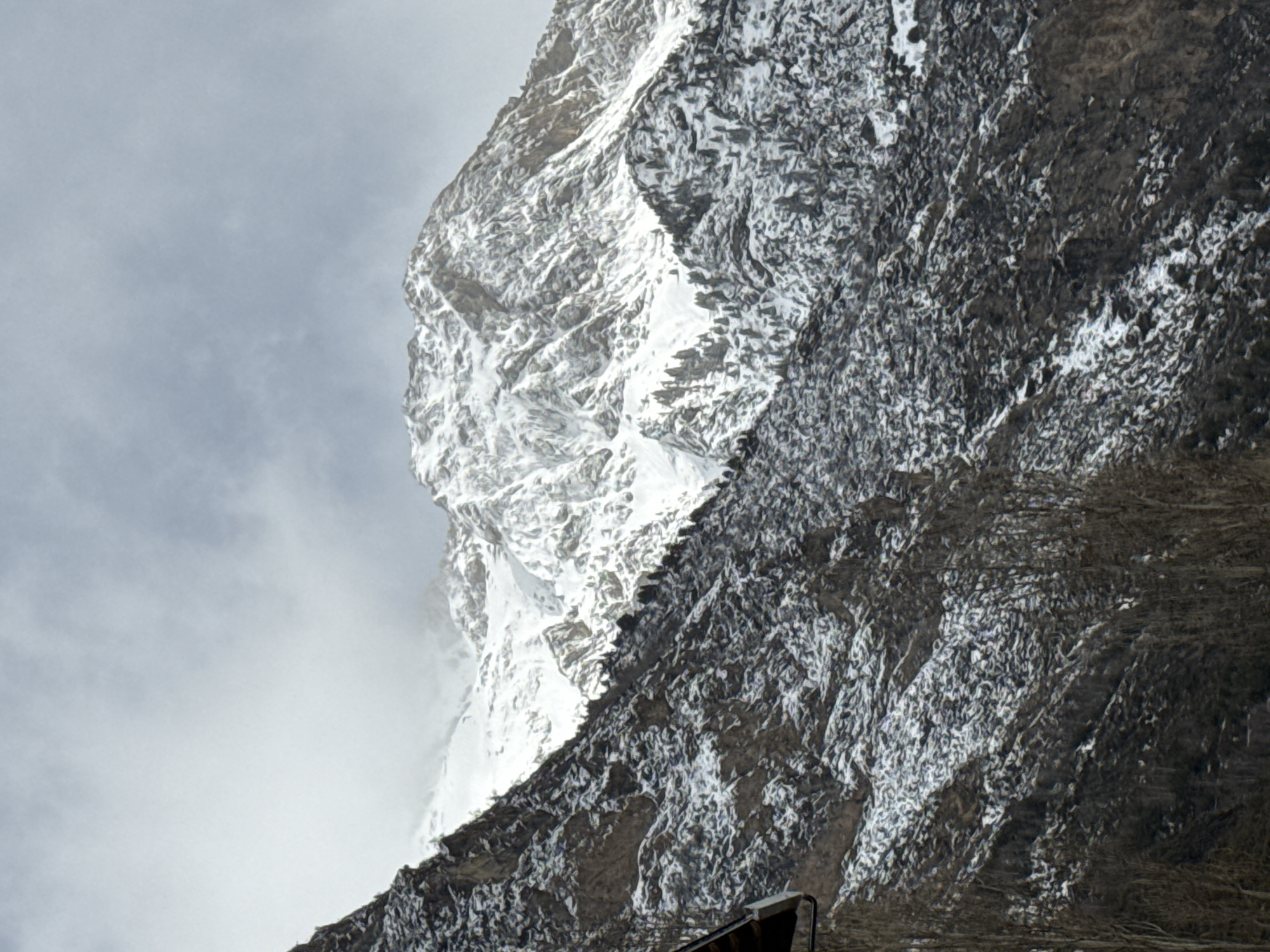 Mountain face shows ice, snow contrast near Benasque