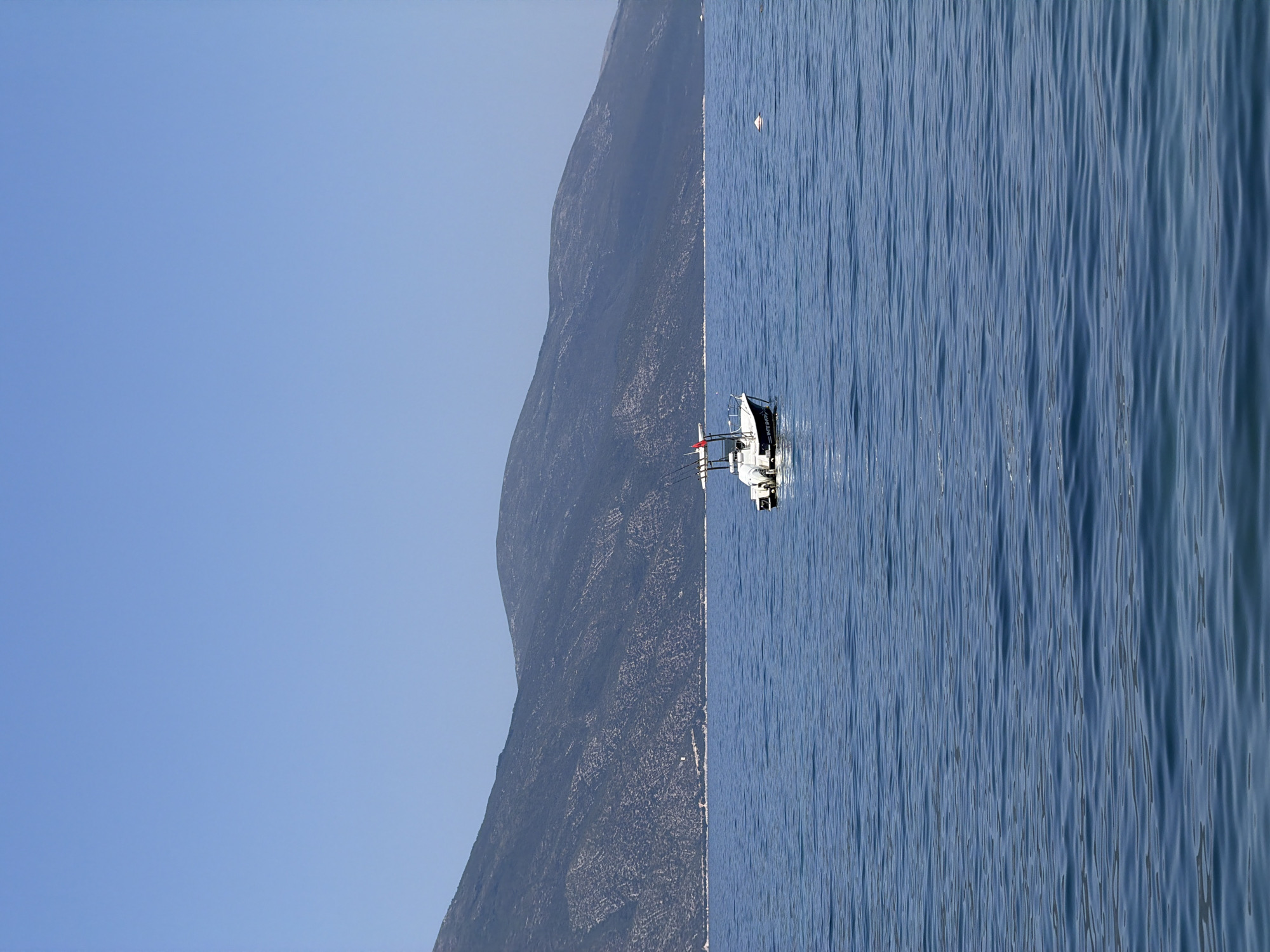 Jumping and swimming off a pier in Orikum, Albania