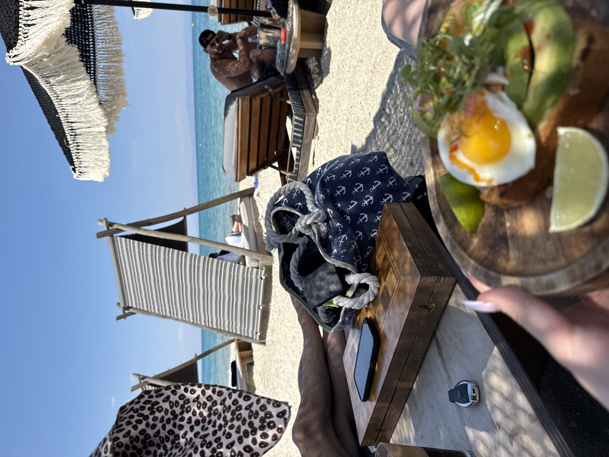 Beachside brunch and laptop time at a Greek beach club