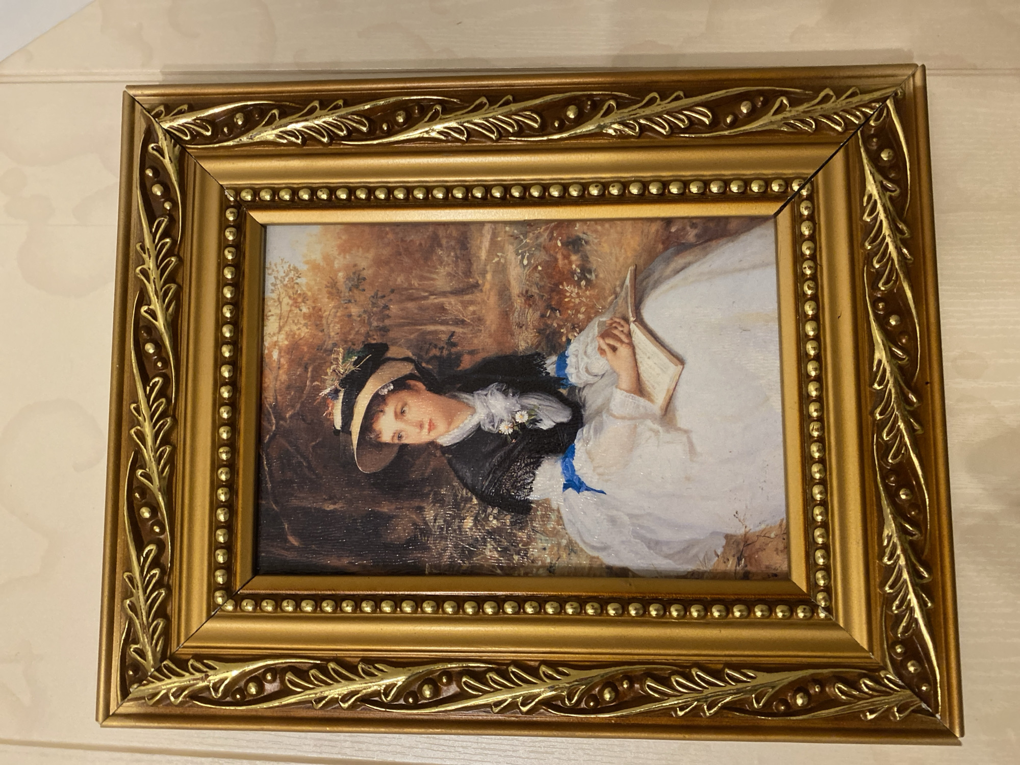 Indoor collection of decorative art and figurines documented