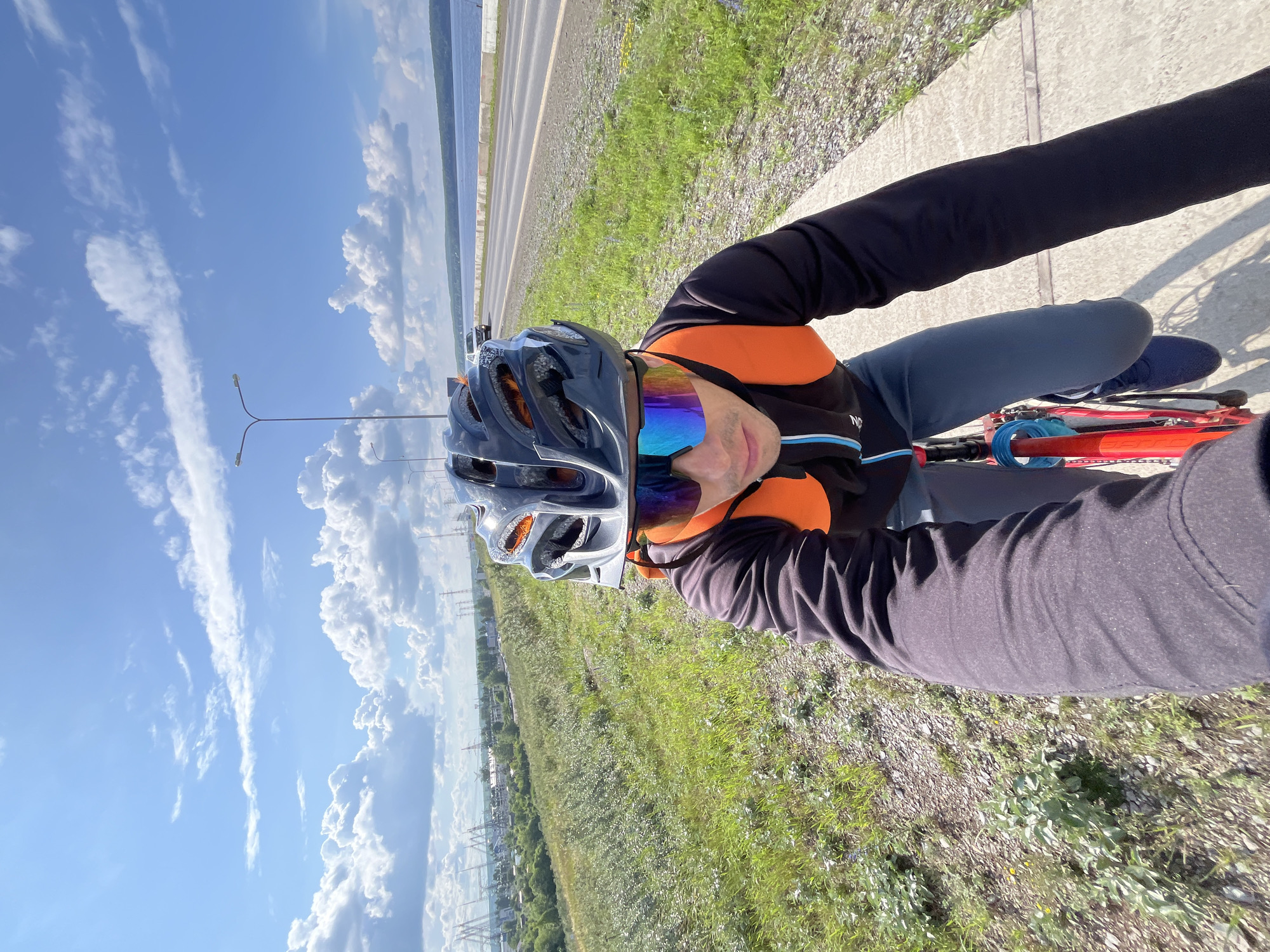 Bicycle ride along waterfront path in Chaikovsky, Russia