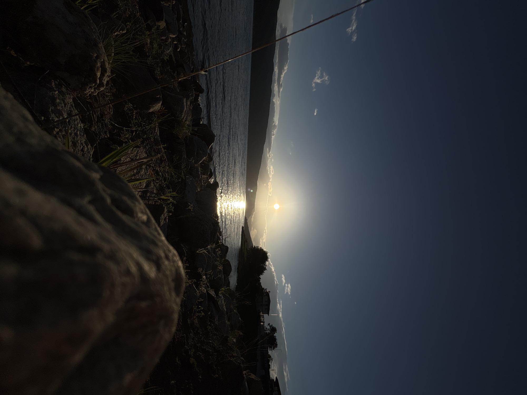 Lakeside sunset fishing scene documented by multiple witnesses