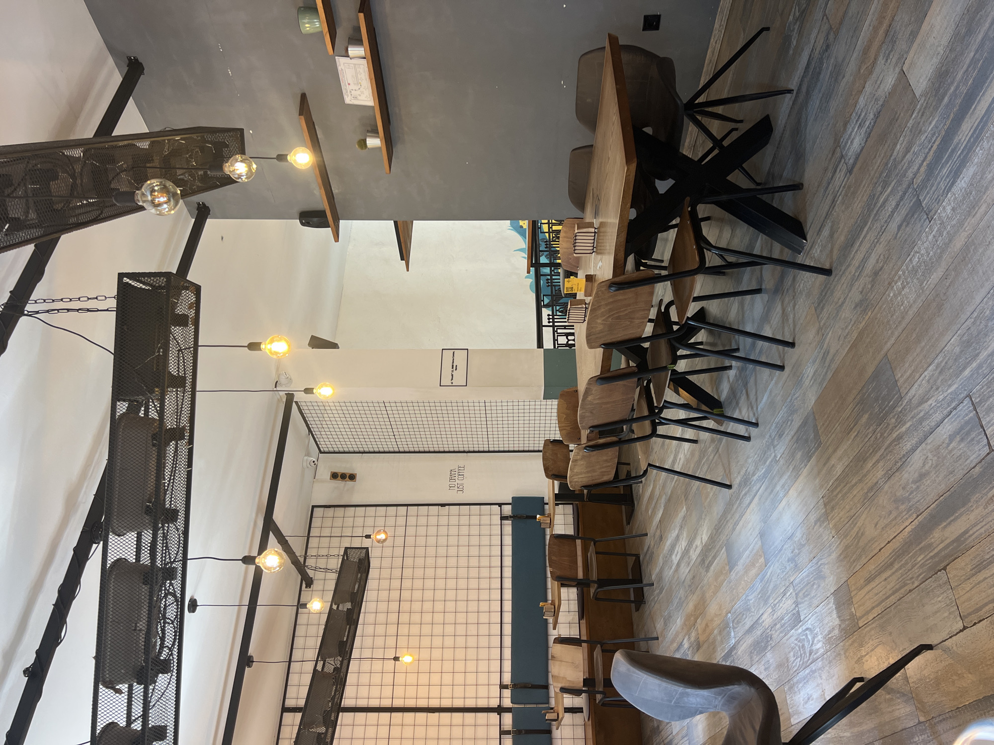 Sunlit café table with a laptop, Varna
