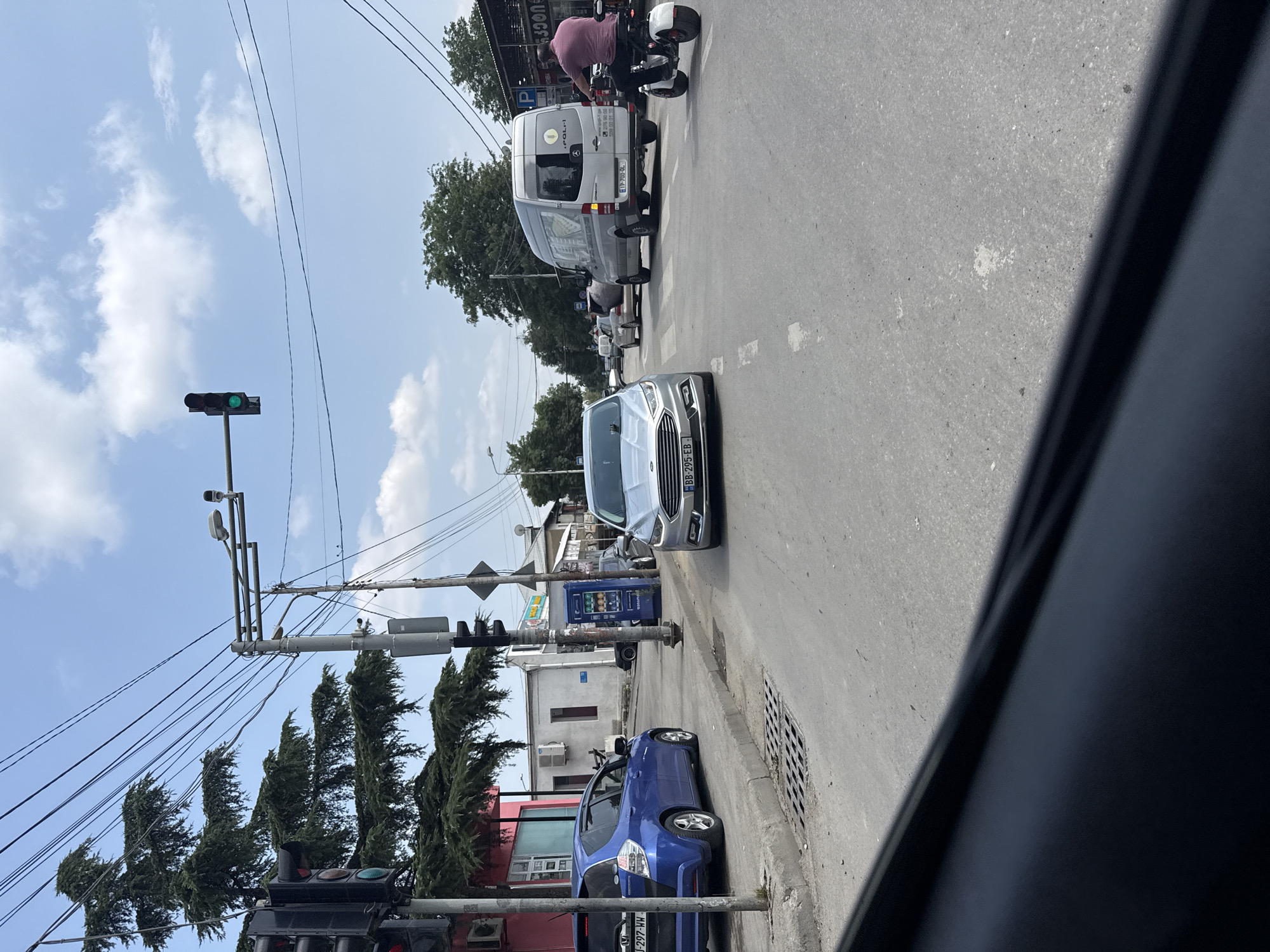 Everyday street scenes from a Tbilisi neighborhood, July 2026