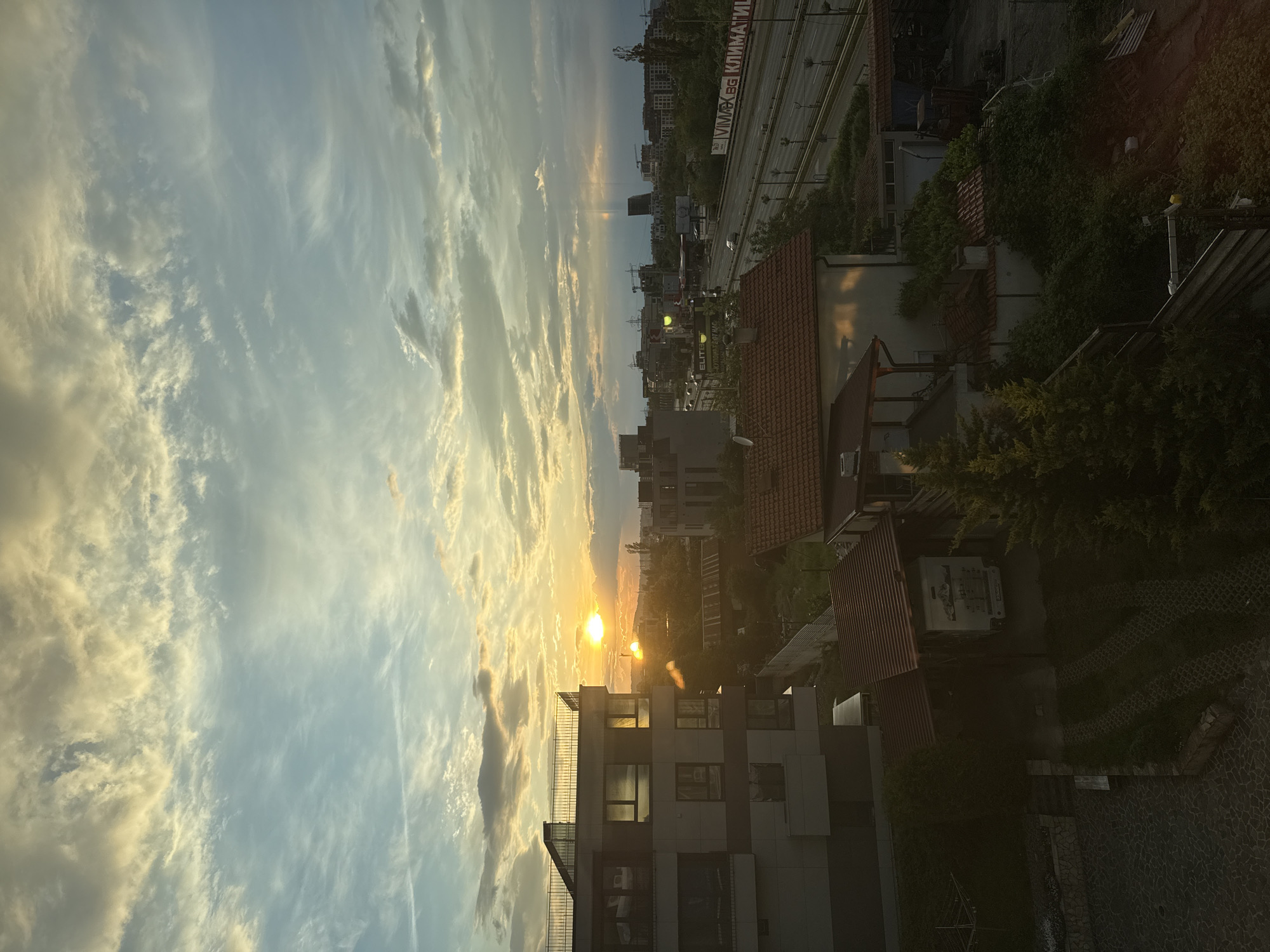 Sunset cityscape with highway captured at unknown location