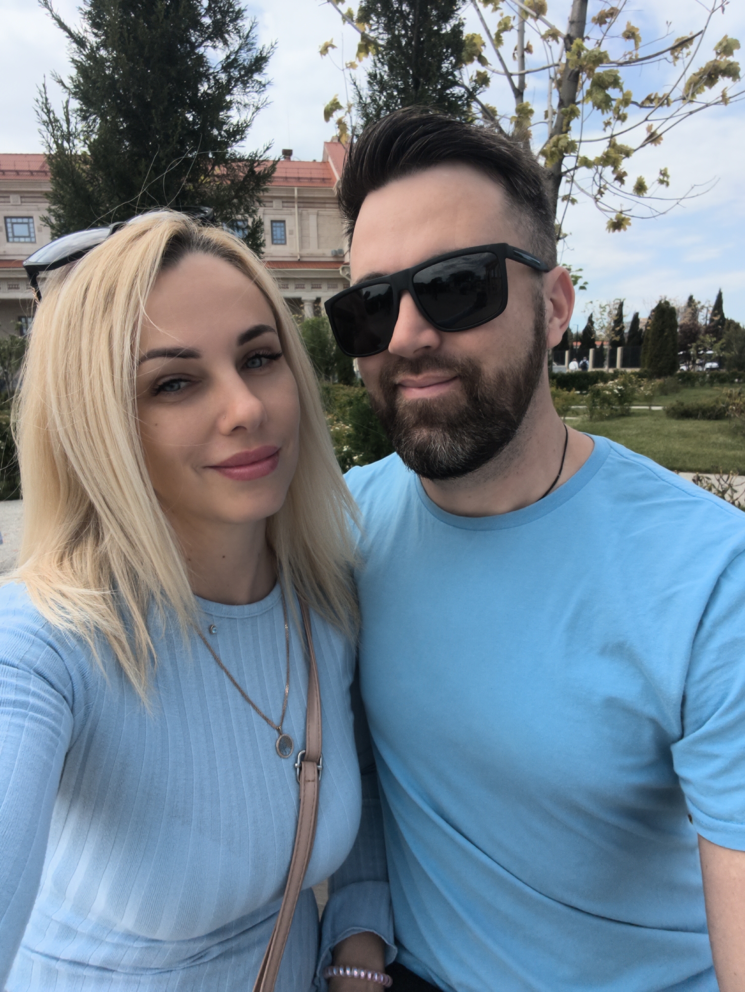 Couple takes selfies at Sevastopol Art Museum during street performance