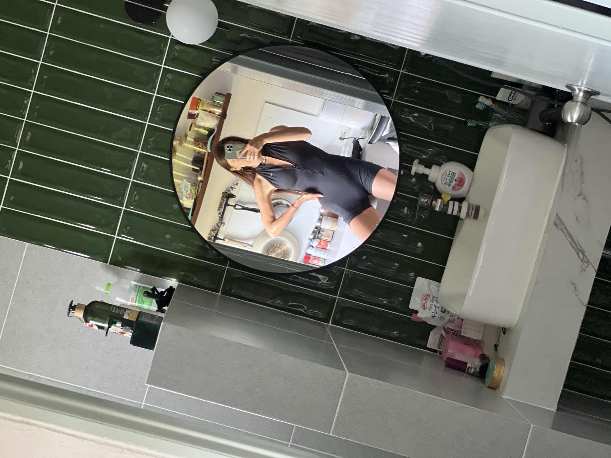 Bathroom interior with green elements documented early morning