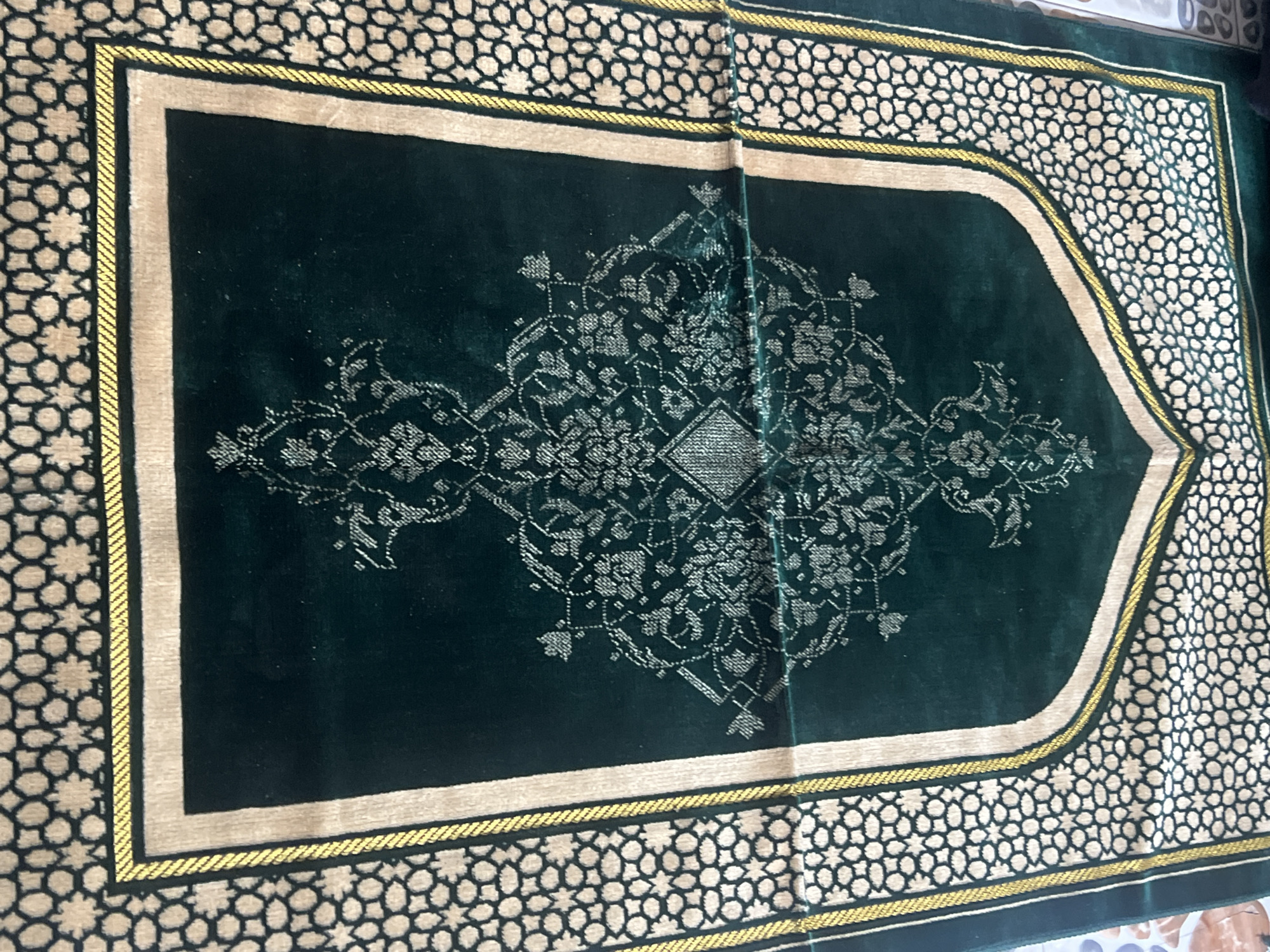 Ornate prayer rug documented in Minna, Nigeria