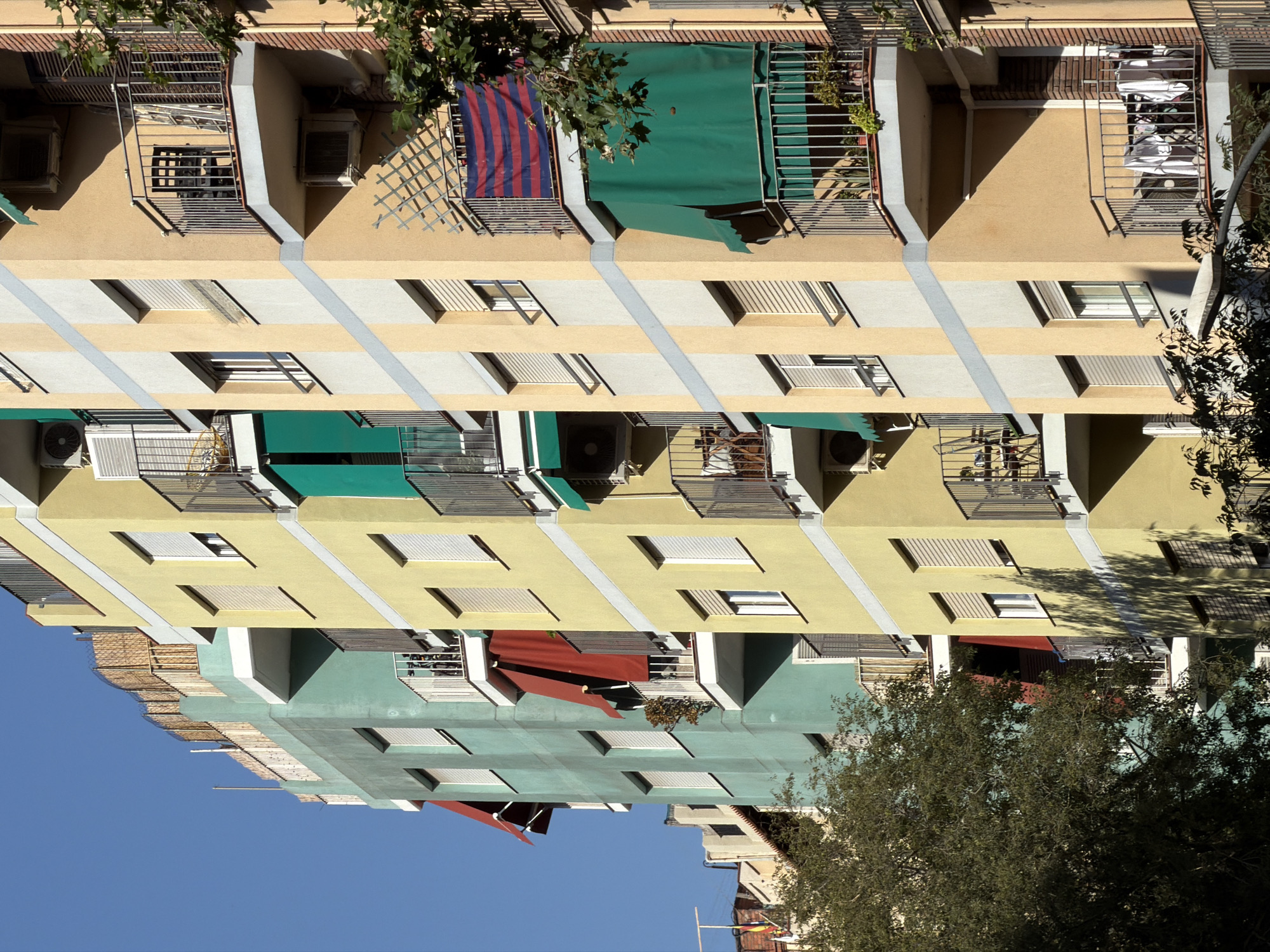 Barcelona streets and facades on a sunny June afternoon