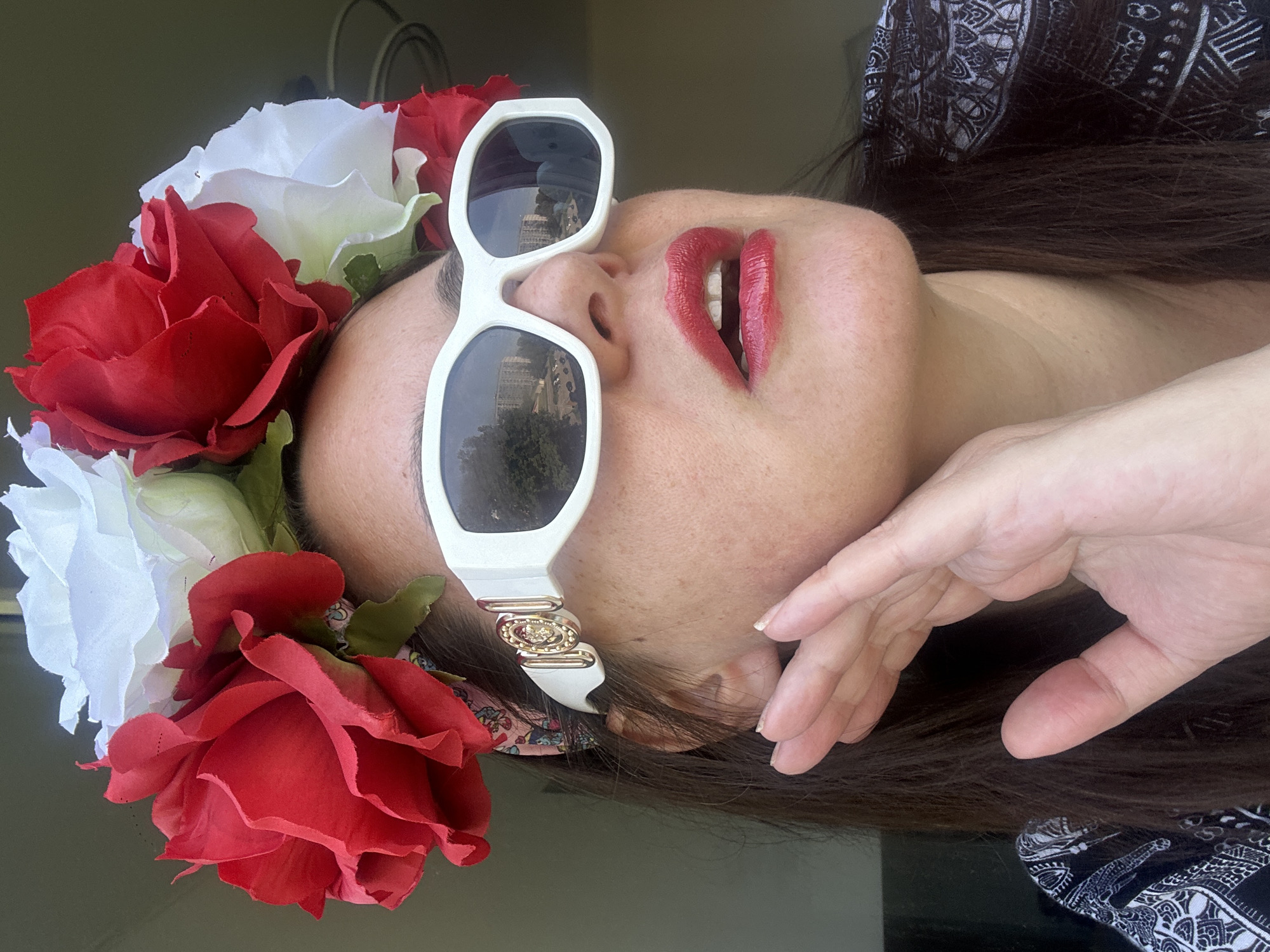 Floral headband and bold shades spotted in Riga