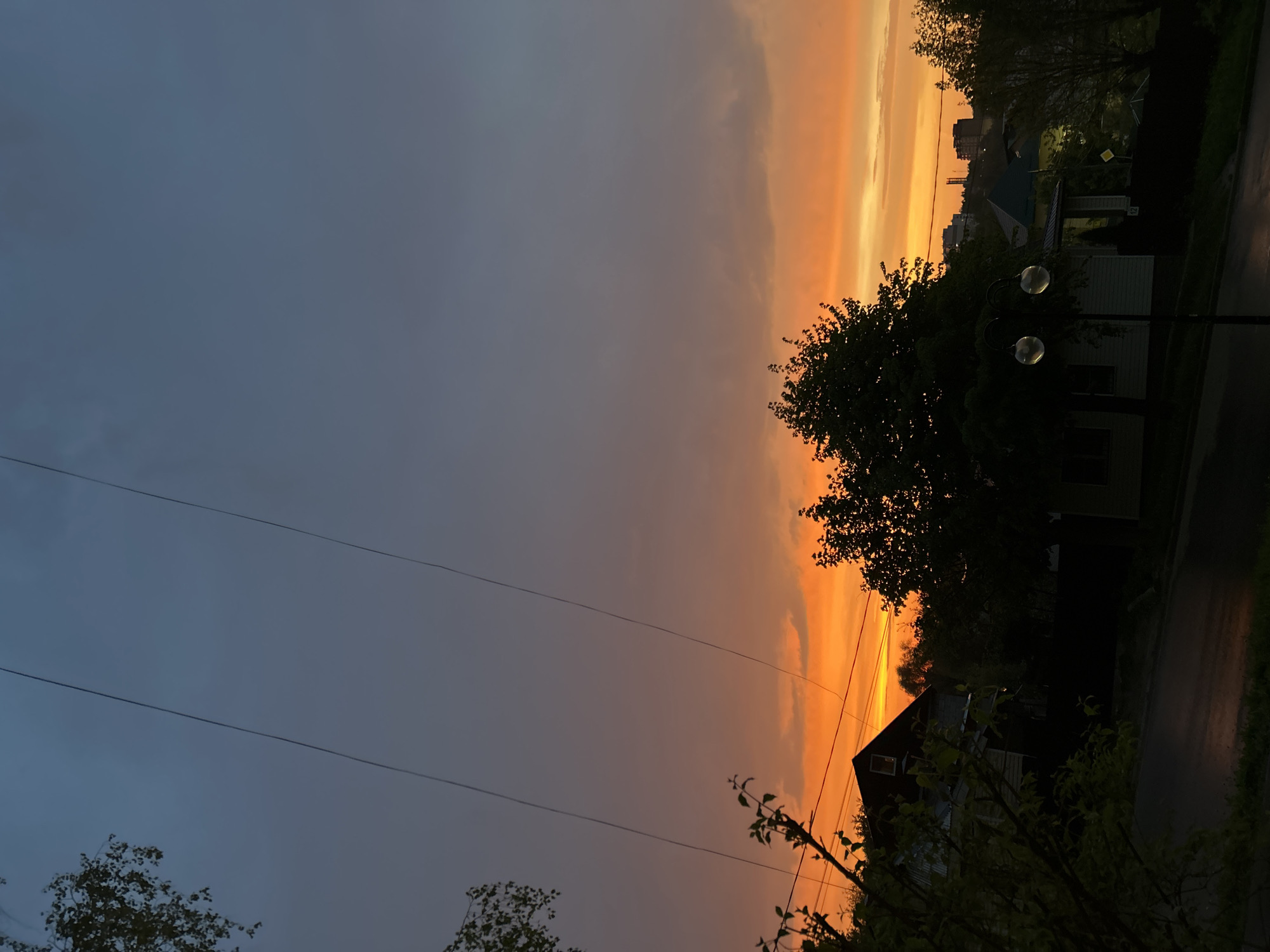 Dramatic sunset captured over residential Klin, Russia neighborhood