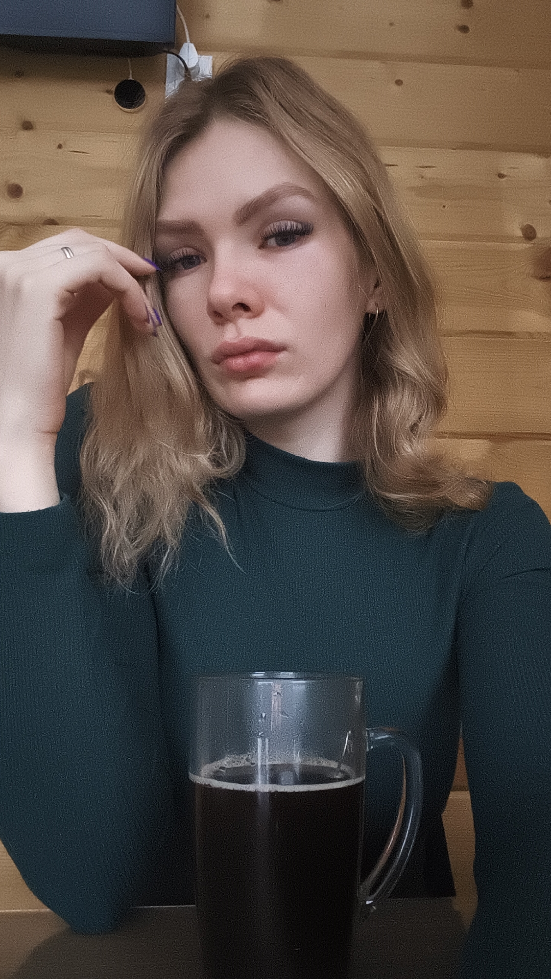 Woman takes selfie in Russian town early morning