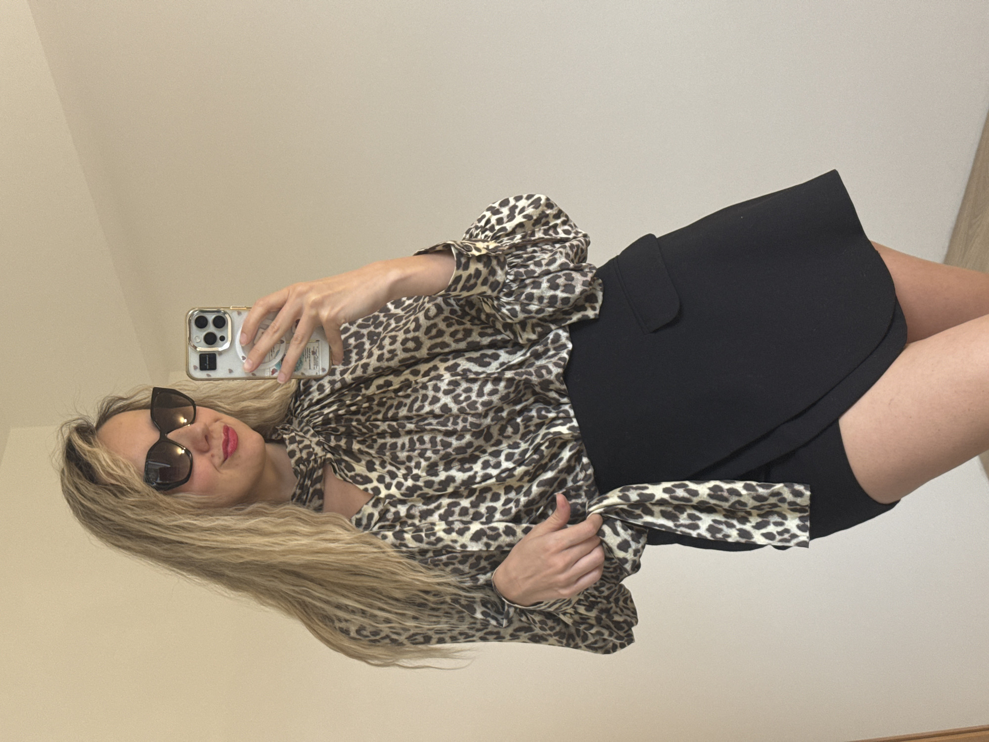 Woman takes selfies in leopard print outfit in Carnikava