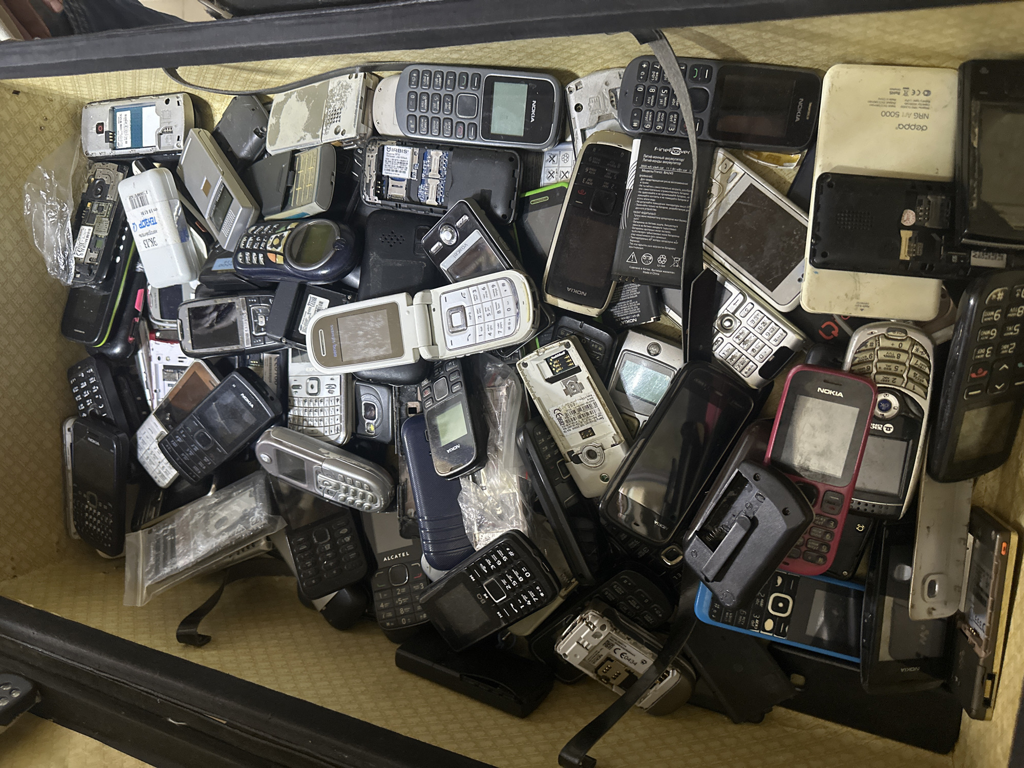 Vintage electronics collection documented in Russian village storage space