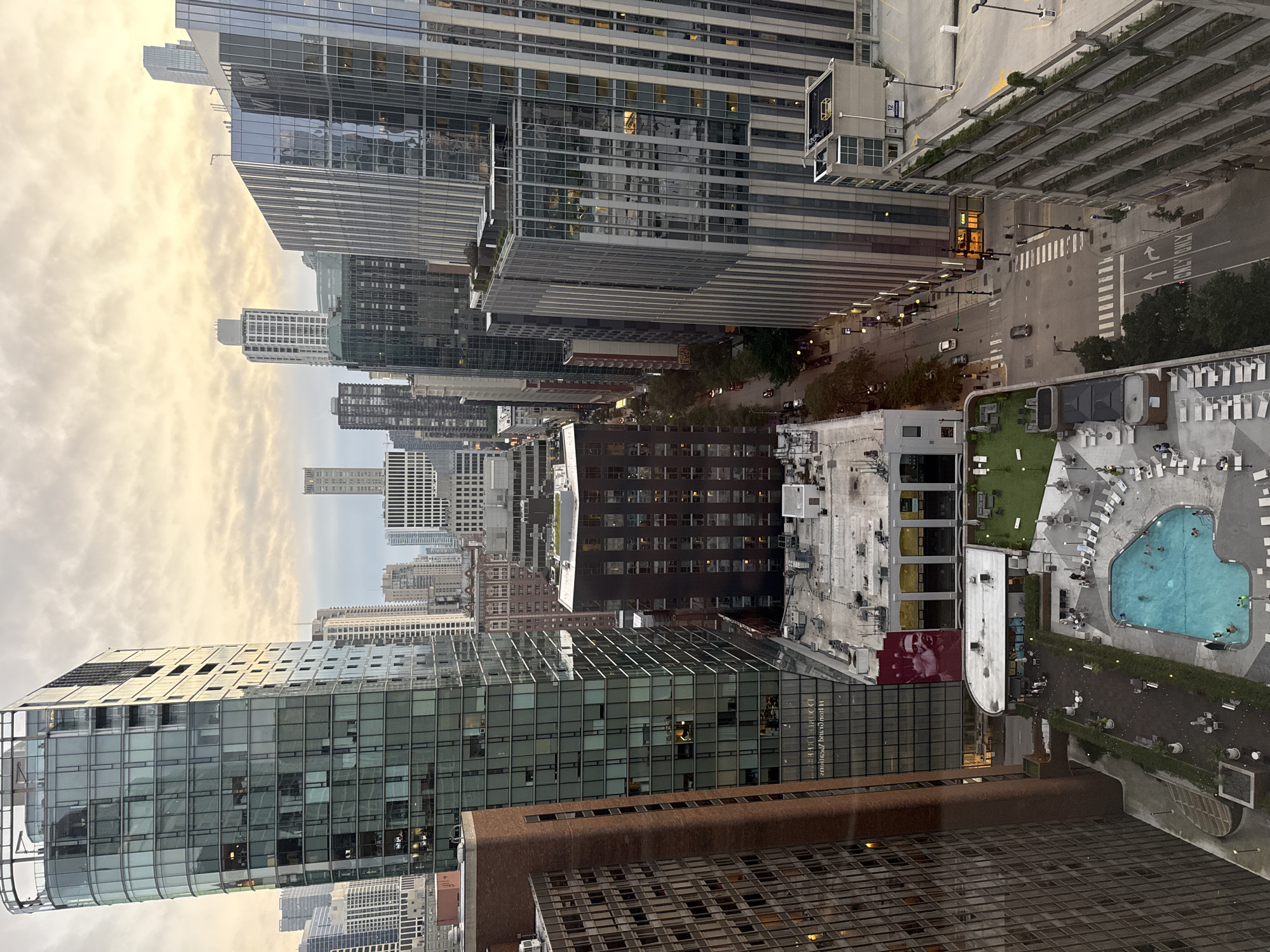 Chicago rooftop pool and skyline at dusk, July 2026