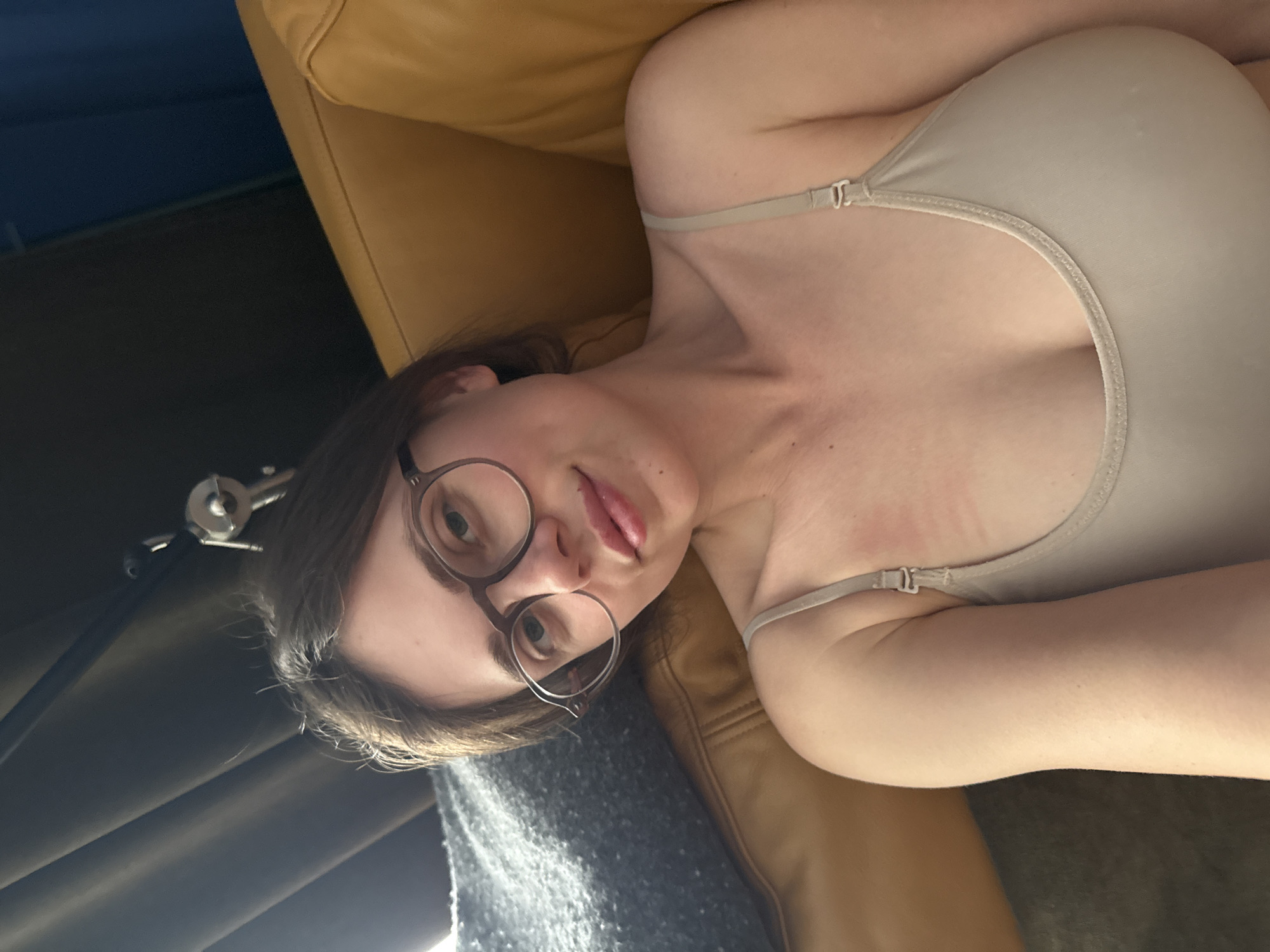 Woman rests in mixed-use Vienna interior space