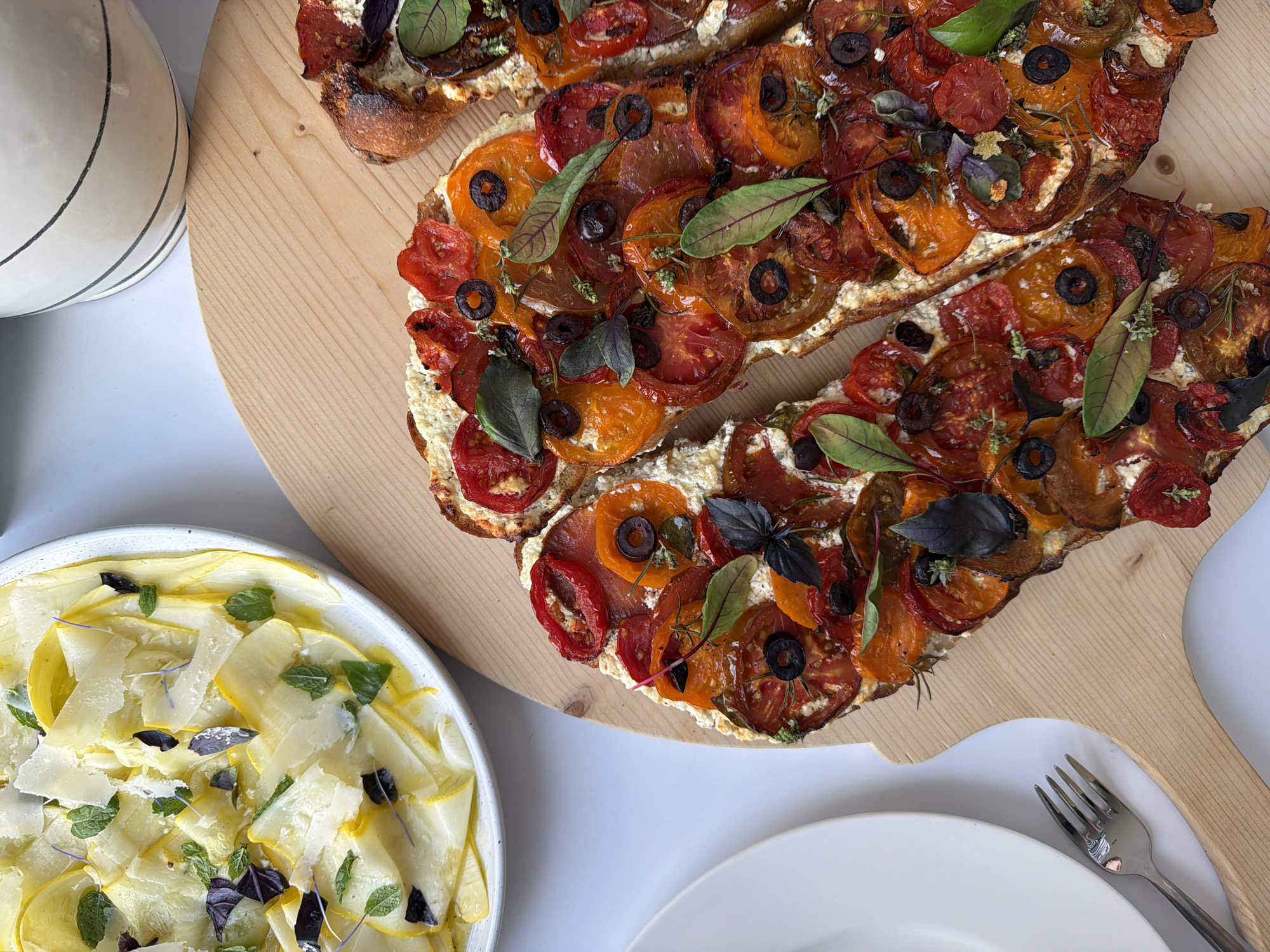 Fresh summer dishes laid out in a Gangloff kitchen