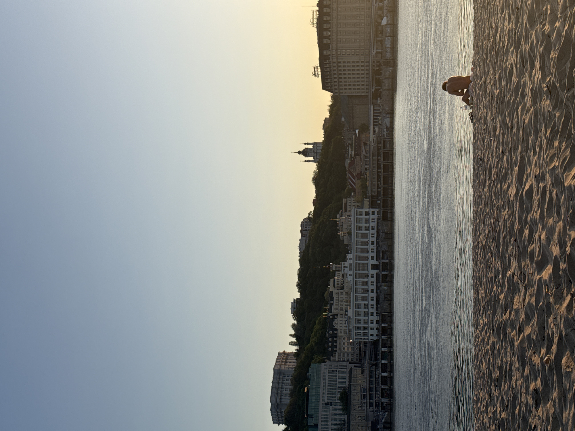 Evening beach leisure observed along Kyiv's Dnieper River
