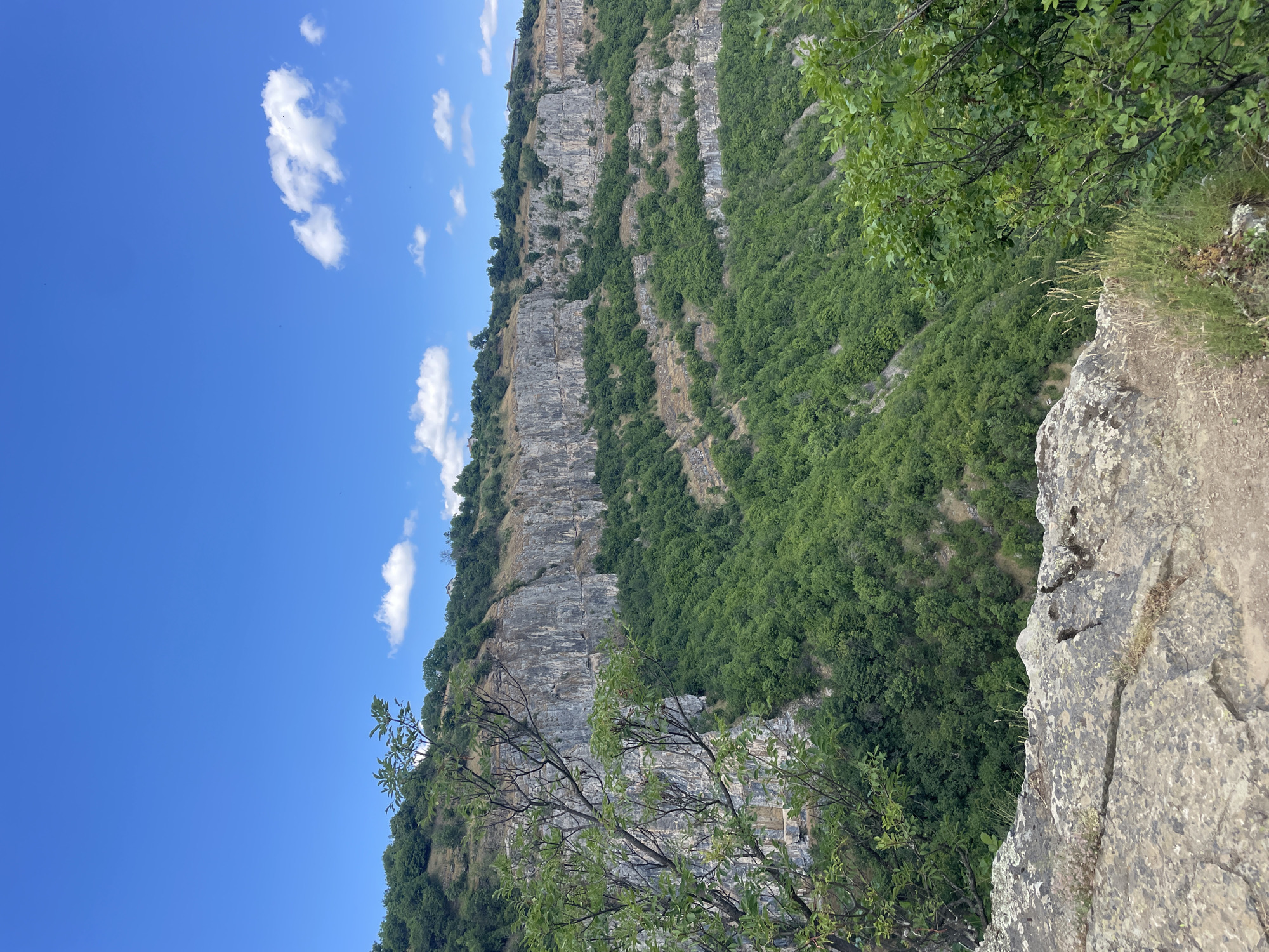 Rocky overlook views across forested valleys in Zasele, Bulgaria