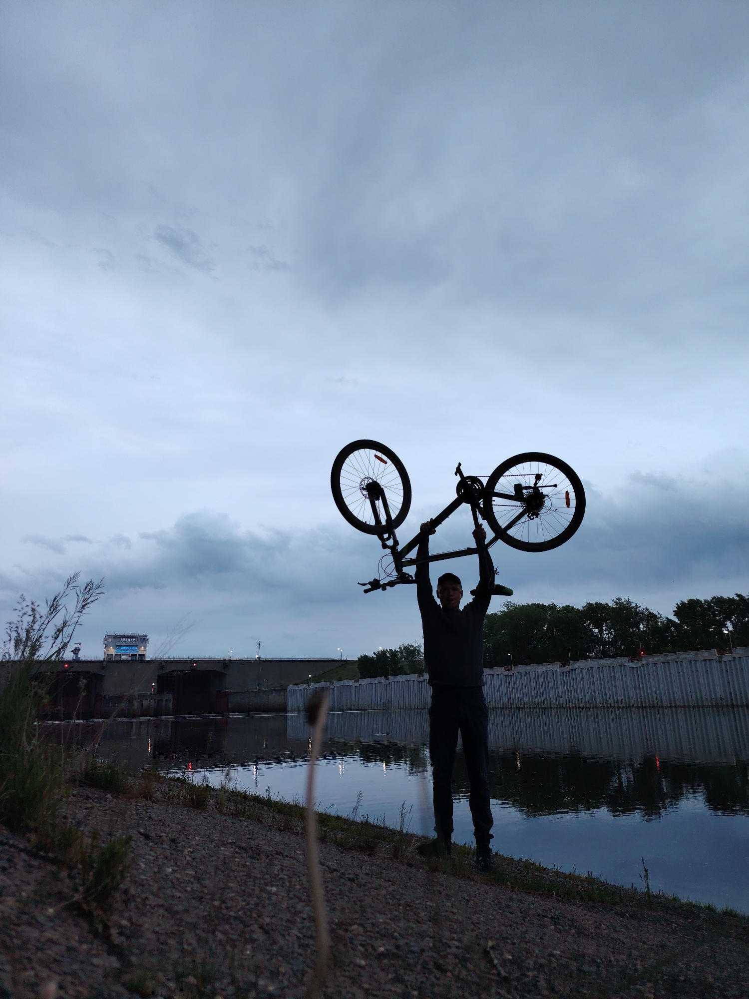 Evening waterfront activities captured in Chaikovsky, Russia