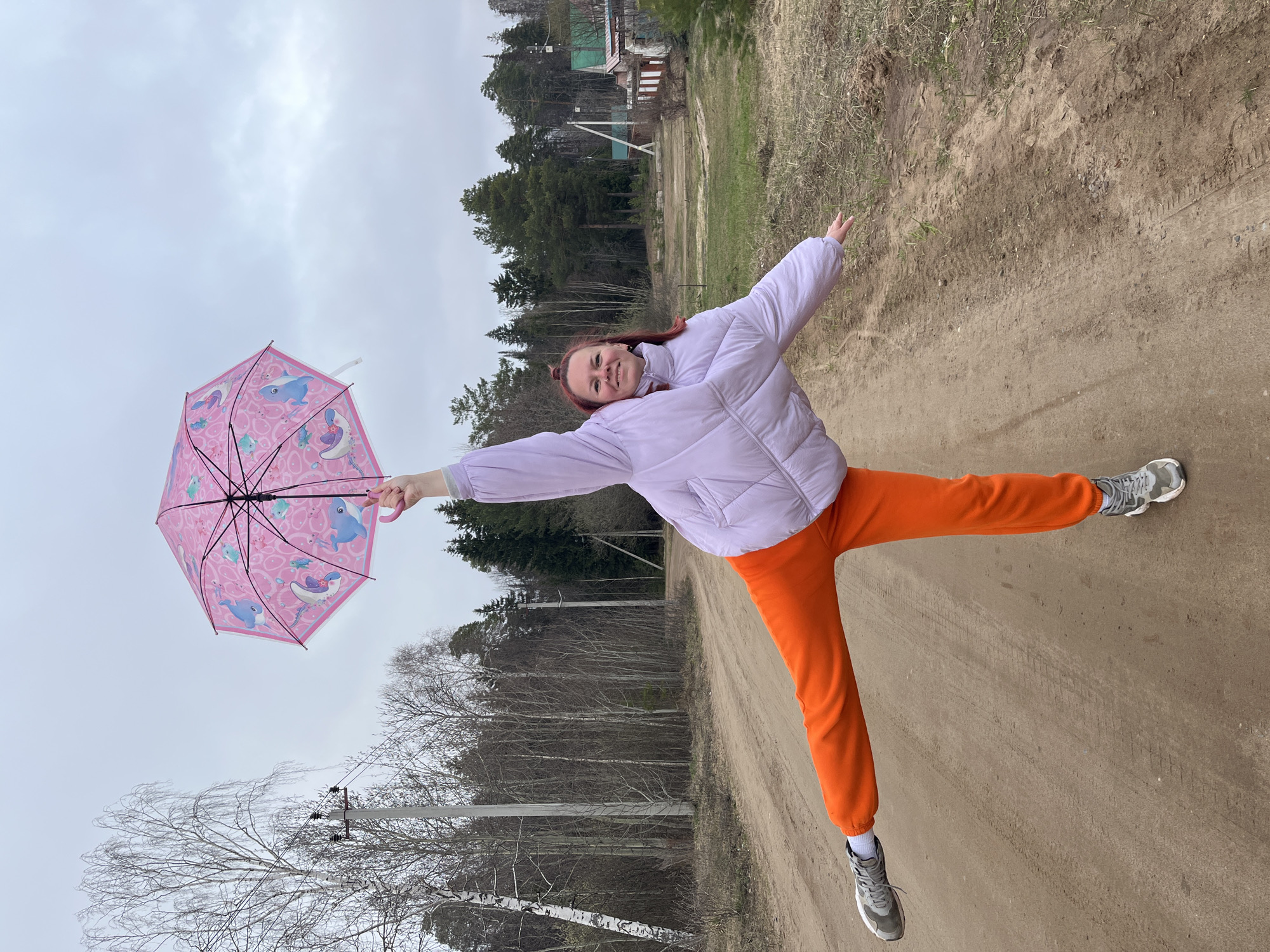 Playful outdoor moments captured on rural roads near Chaikovsky