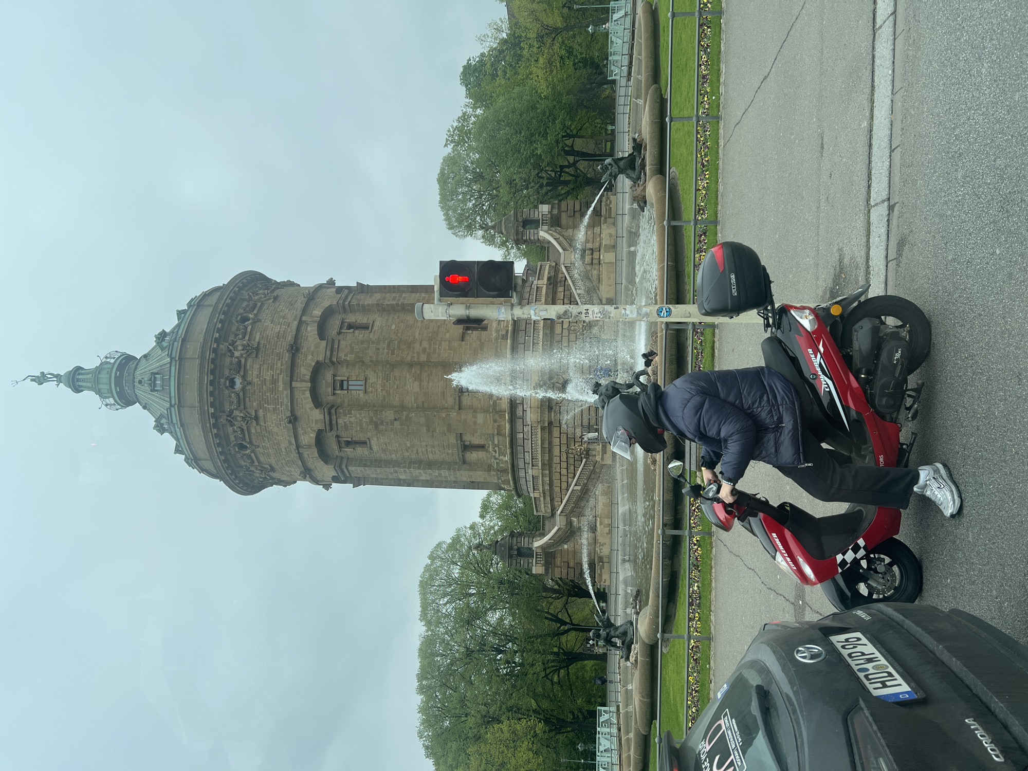 Everyday life continues around Mannheim's historic water tower