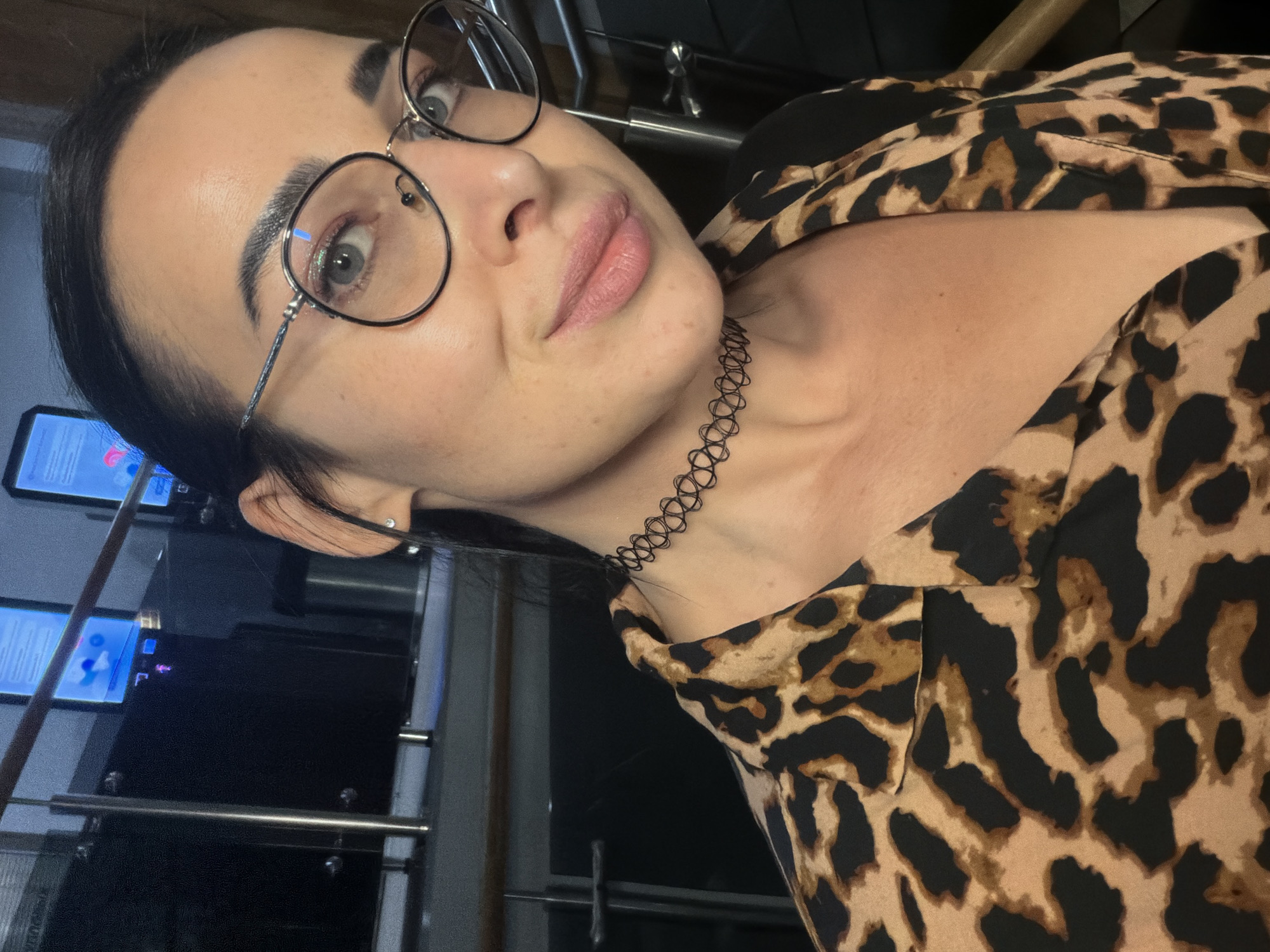 Woman takes selfies indoors in Saint Petersburg