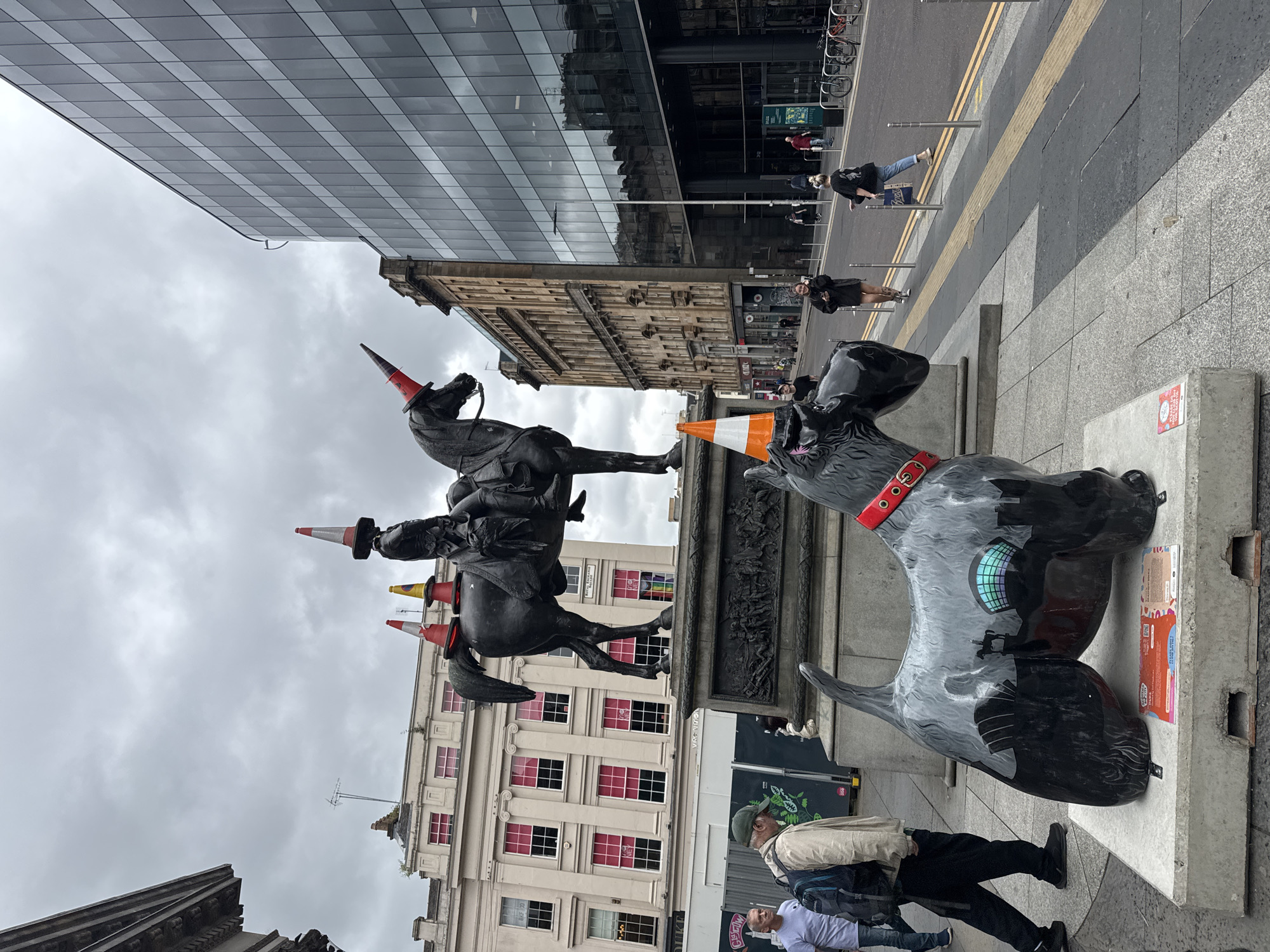 Glasgow's cone-topped statues doing their thing outside GoMA