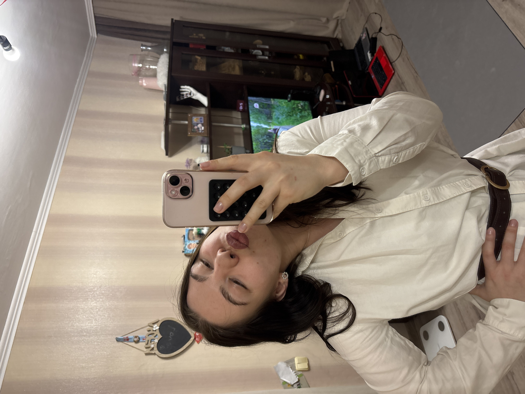 Woman Takes Kissing Selfie in Mirror in Perm