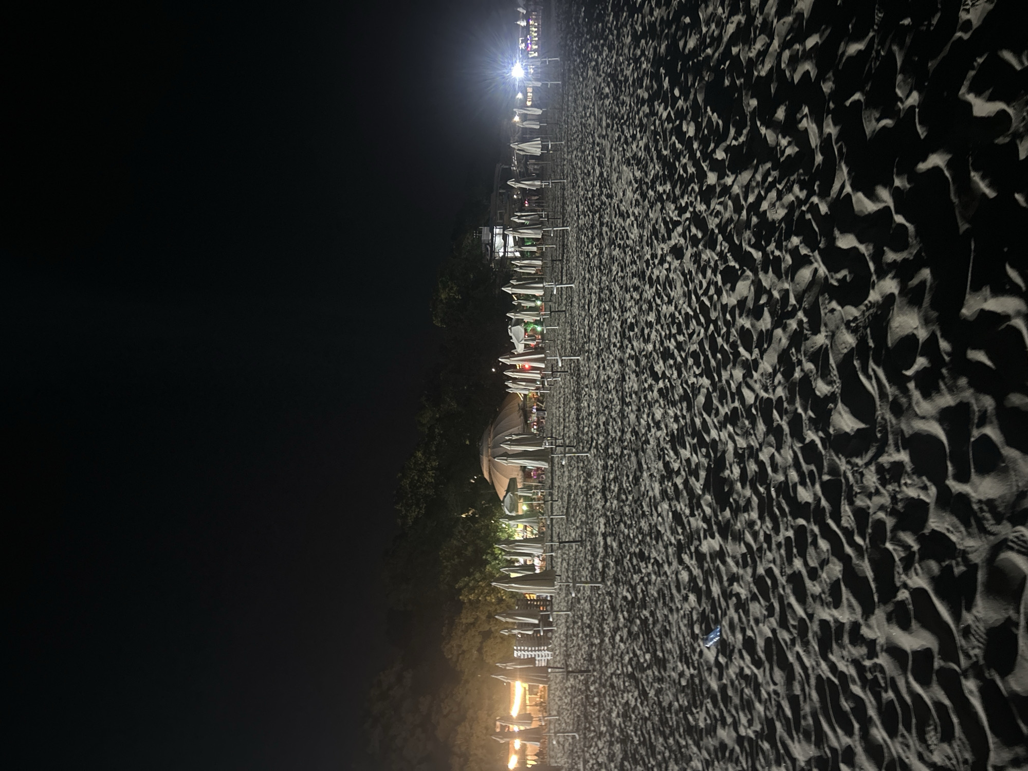 Varna's beach strip winds down on a summer night