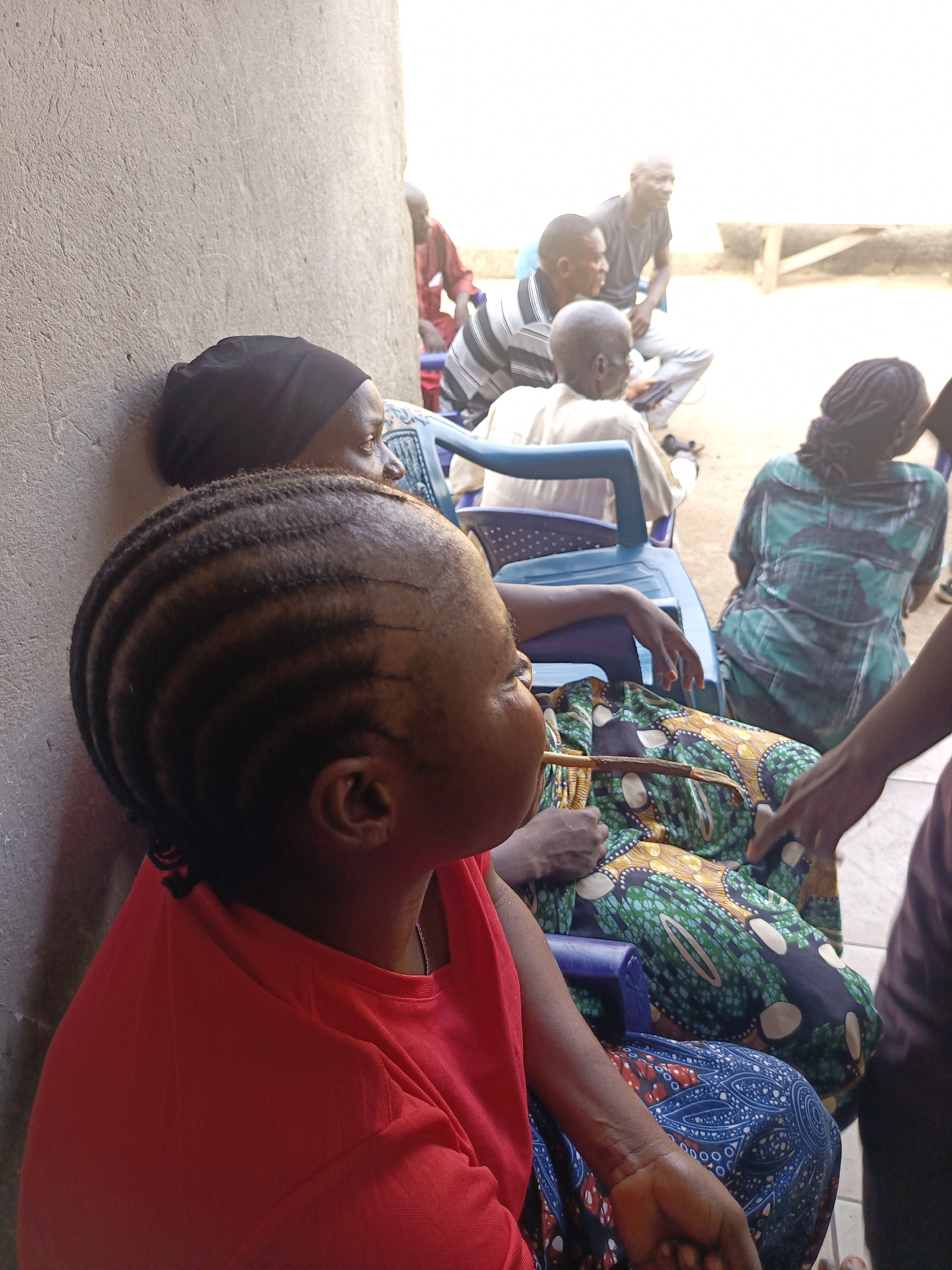 Community gathering observed in Akwanga, Nigeria outdoor setting