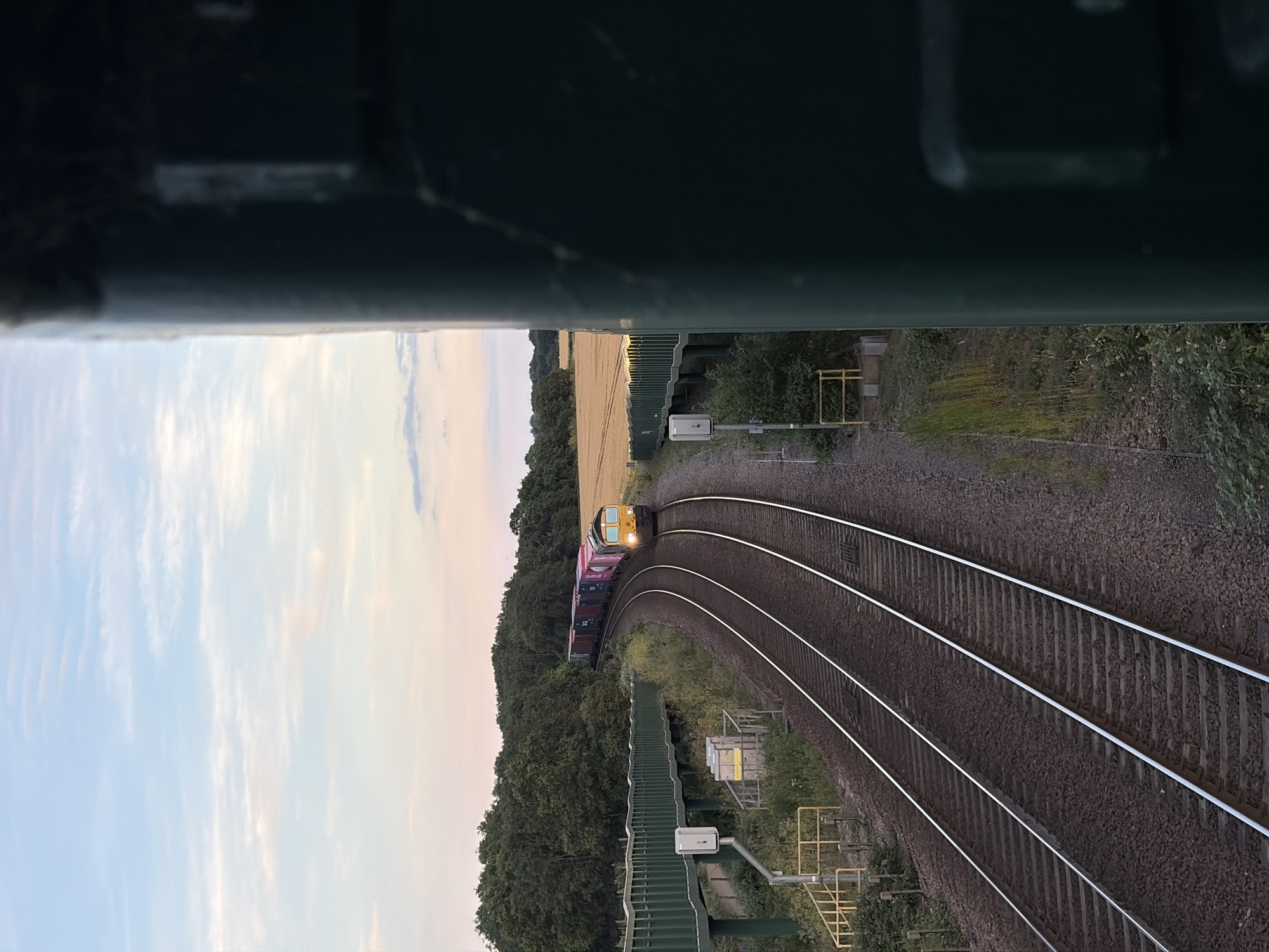 Freight trains rolling through rural East Suffolk on a summer evening
