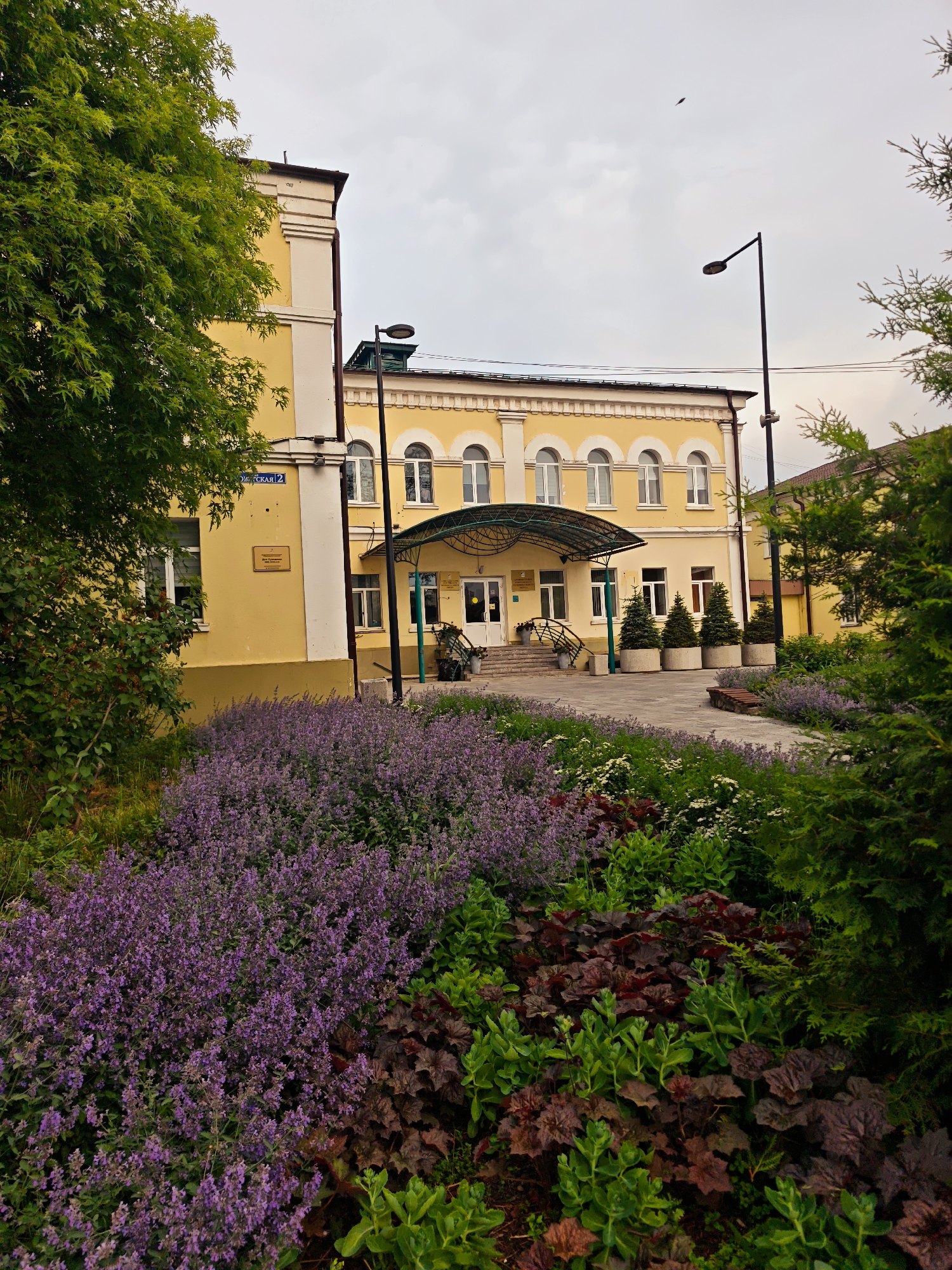 Urban scenes documented: yellow building, cathedral plaza, landscaped park