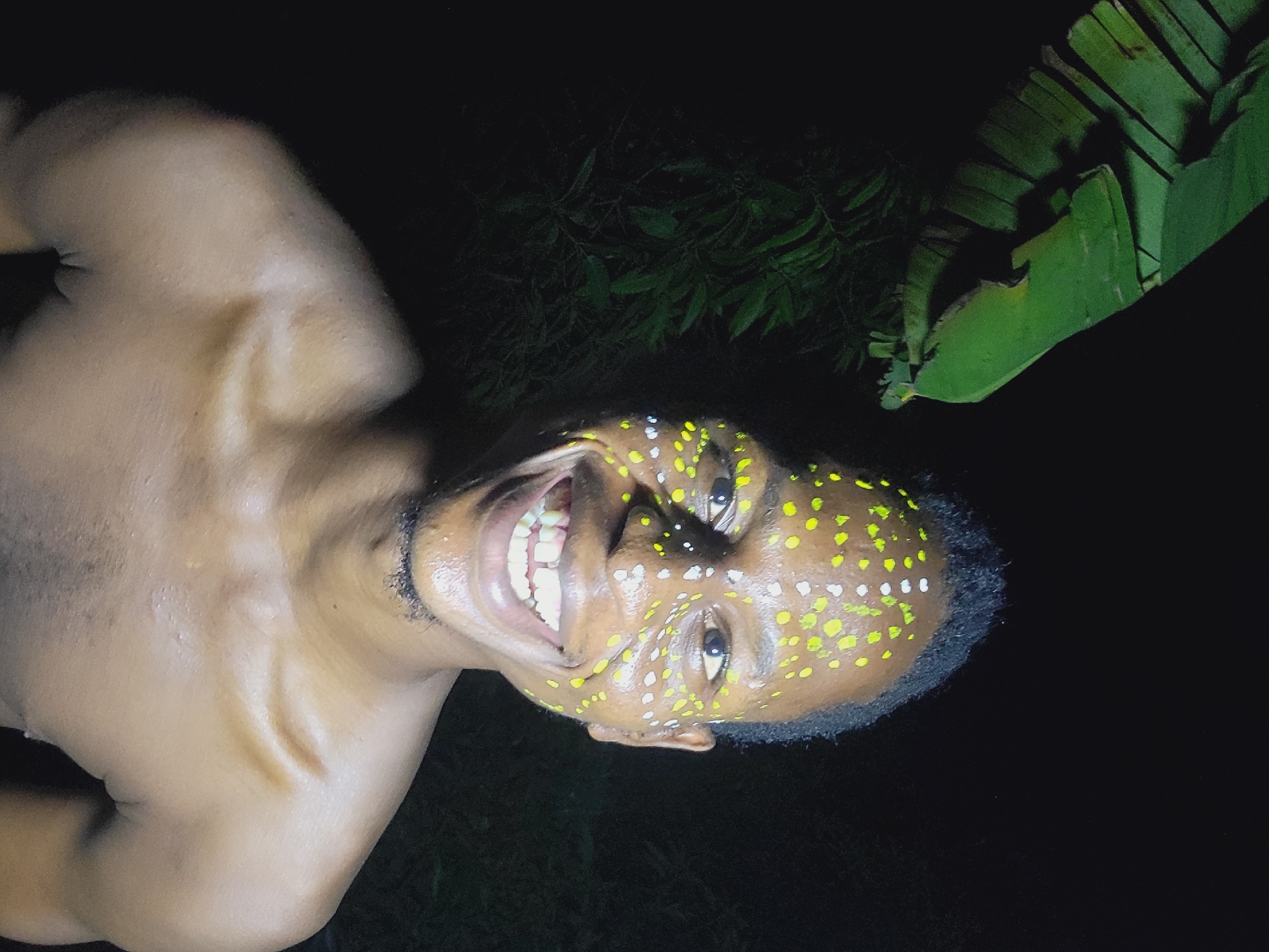 Man with traditional face paint photographed in Nkpor, Nigeria