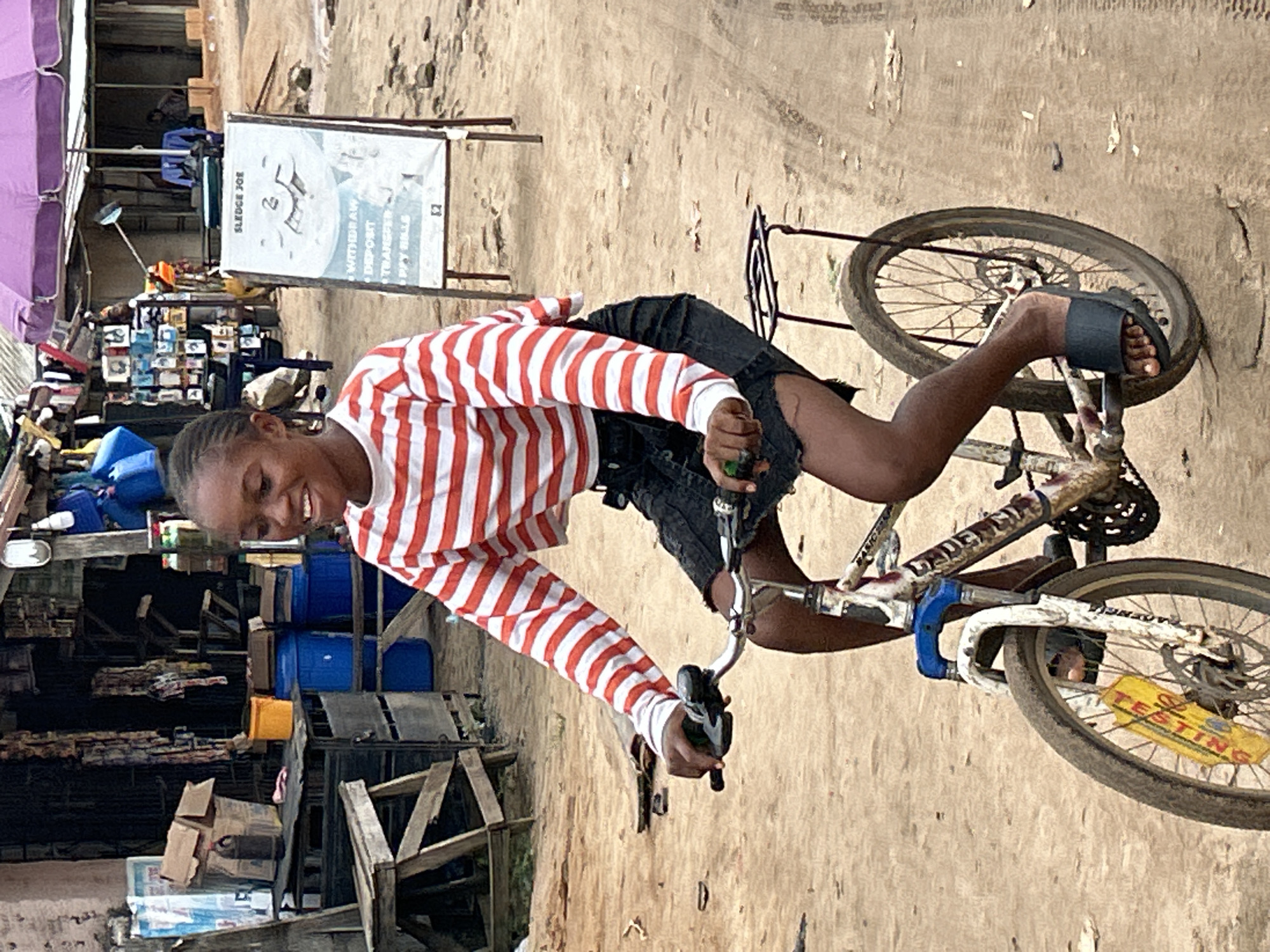 Daily street life along Ihiagwa's dusty roads