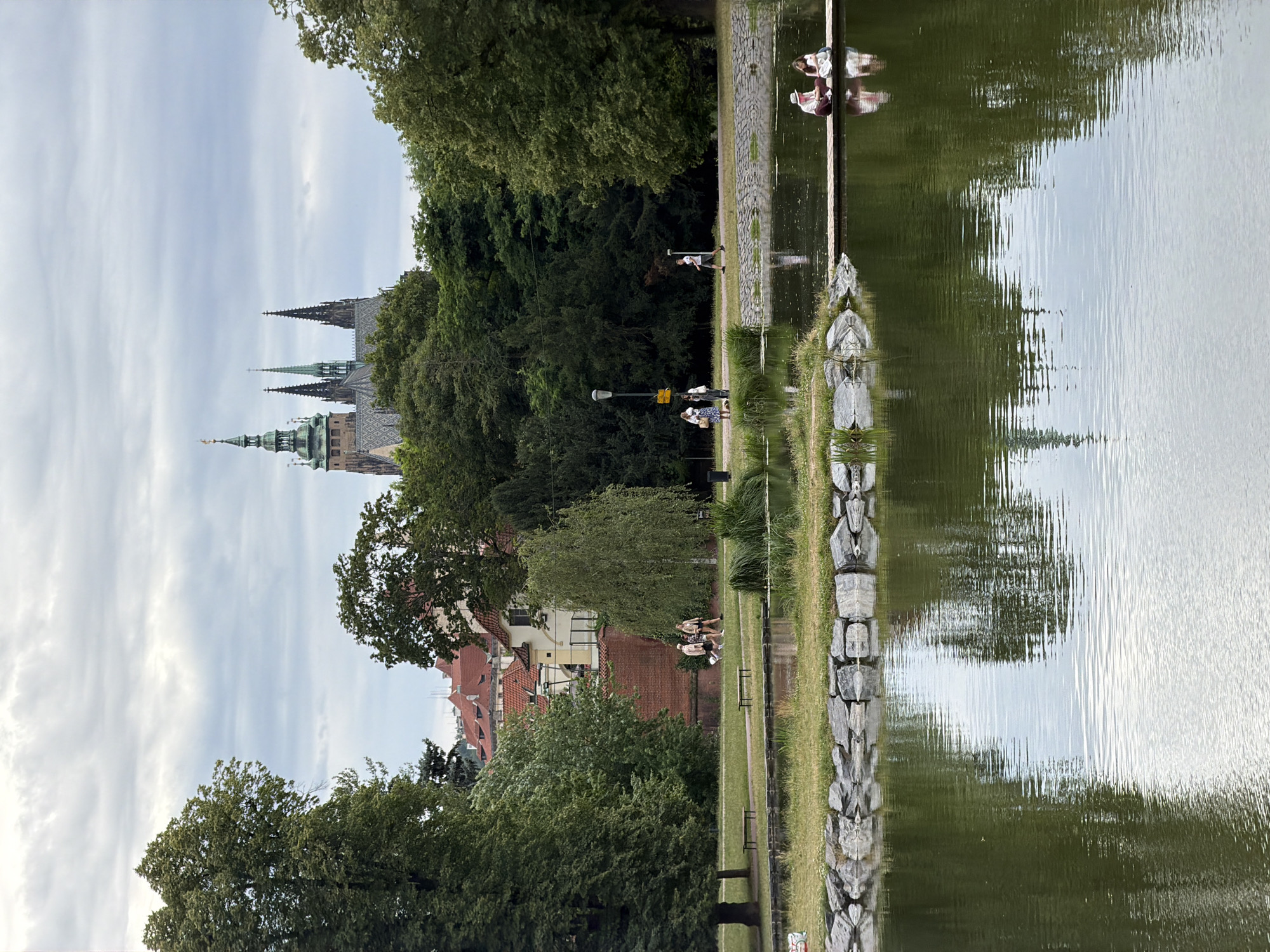 Park fountains and Vltava River views near Prague Castle