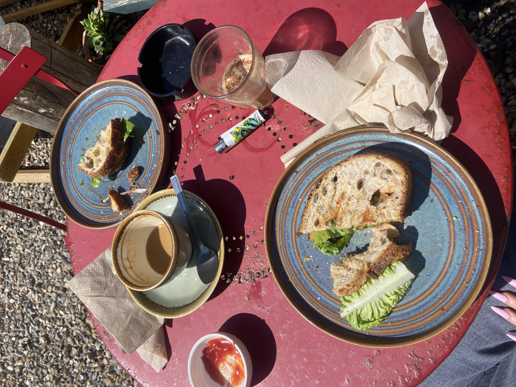 Woman enjoys outdoor café meal in London