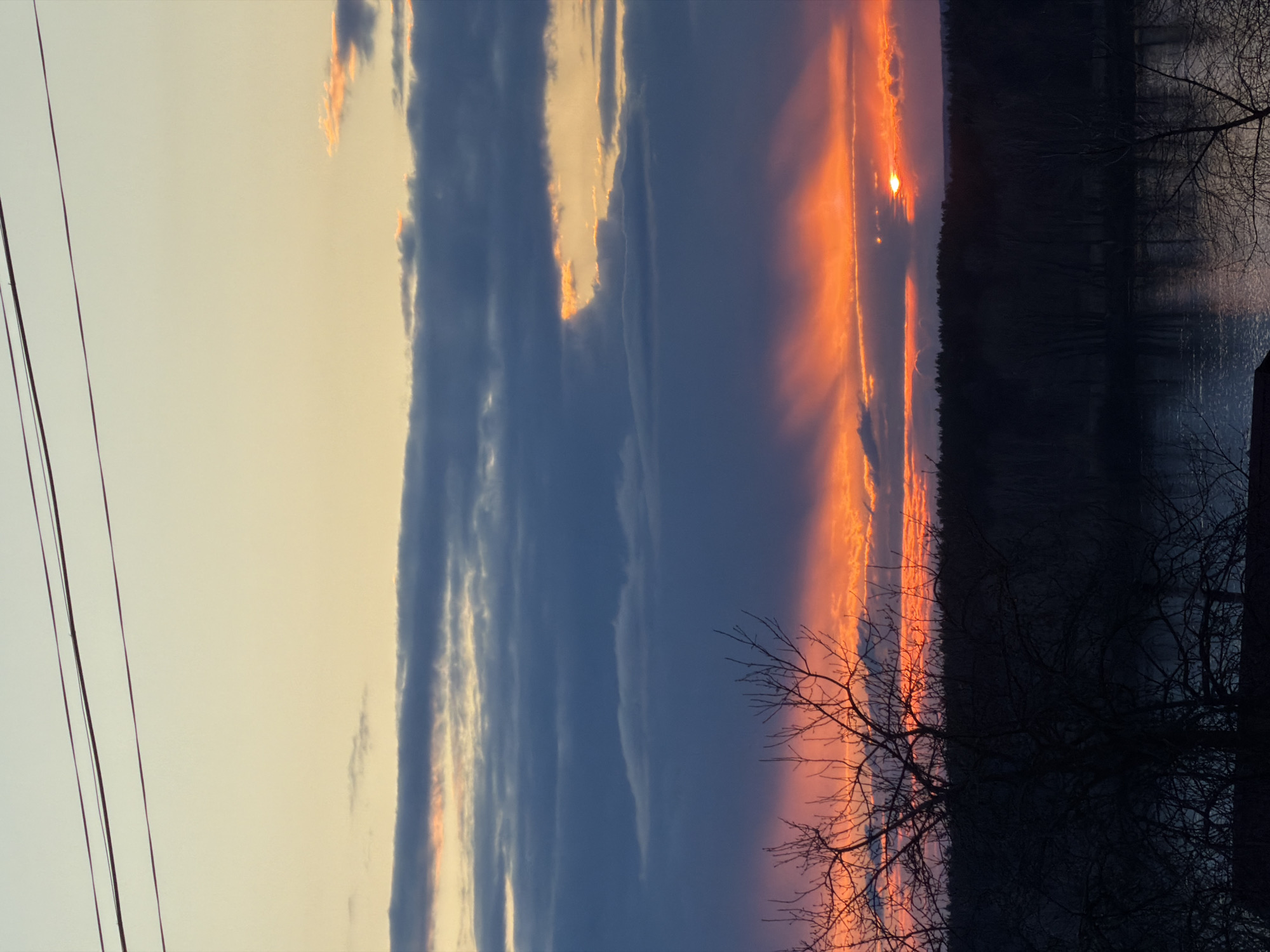 Dramatic sunset witnessed over Chaikovsky, Russia waterways and neighborhoods