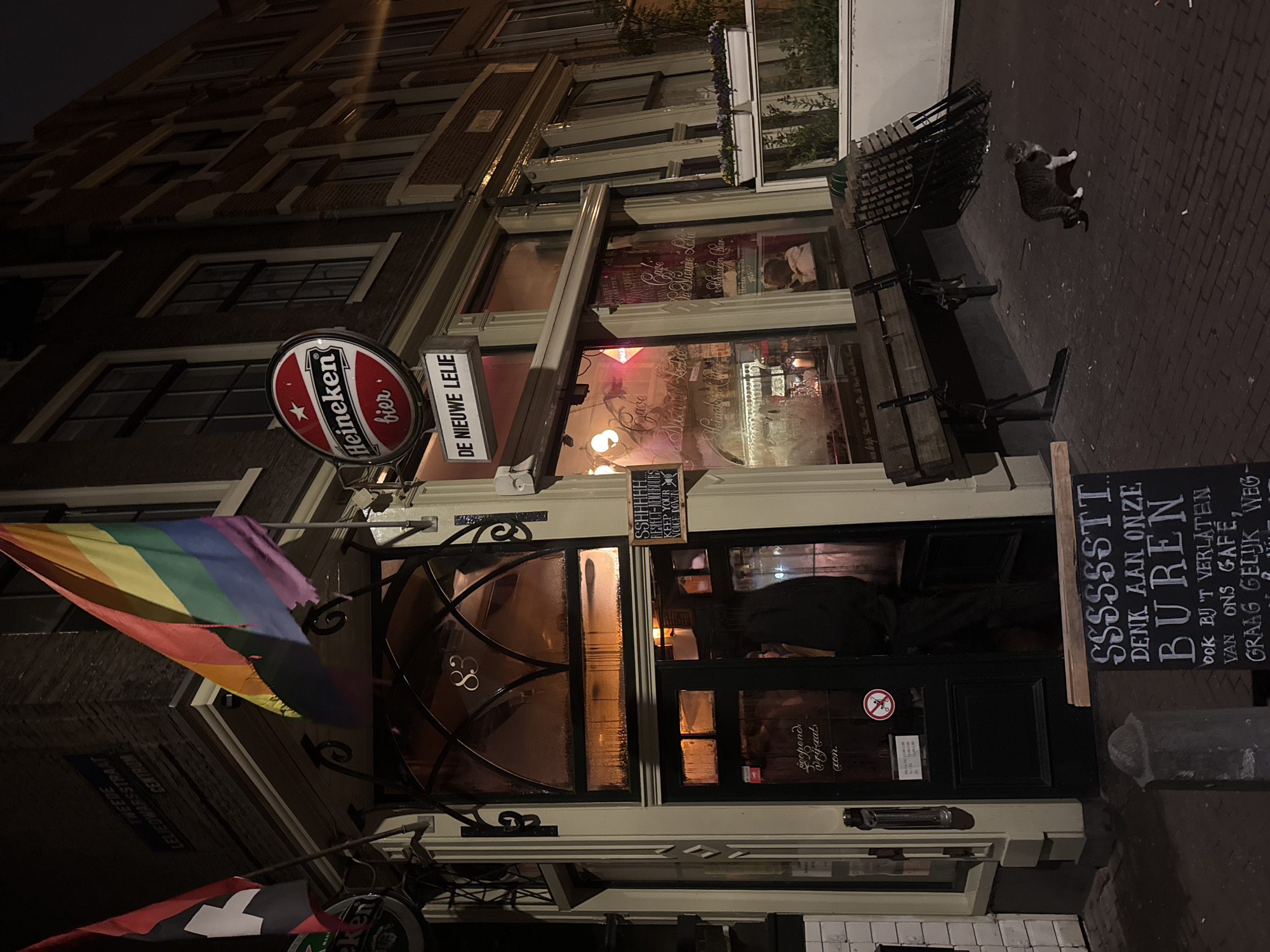 Evening social gathering documented at Amsterdam bar De Nieuwe Lelie