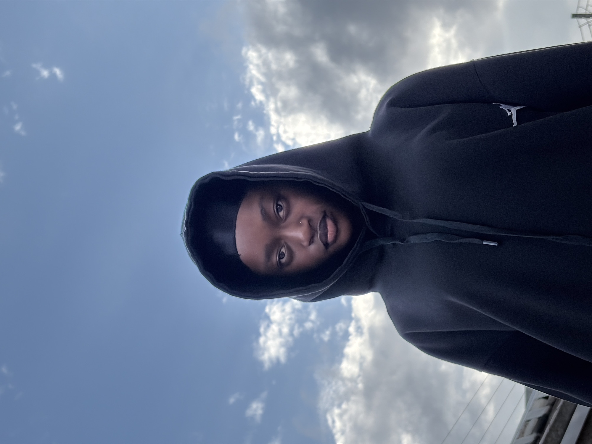Hooded figure and open sky, Igboefon afternoon