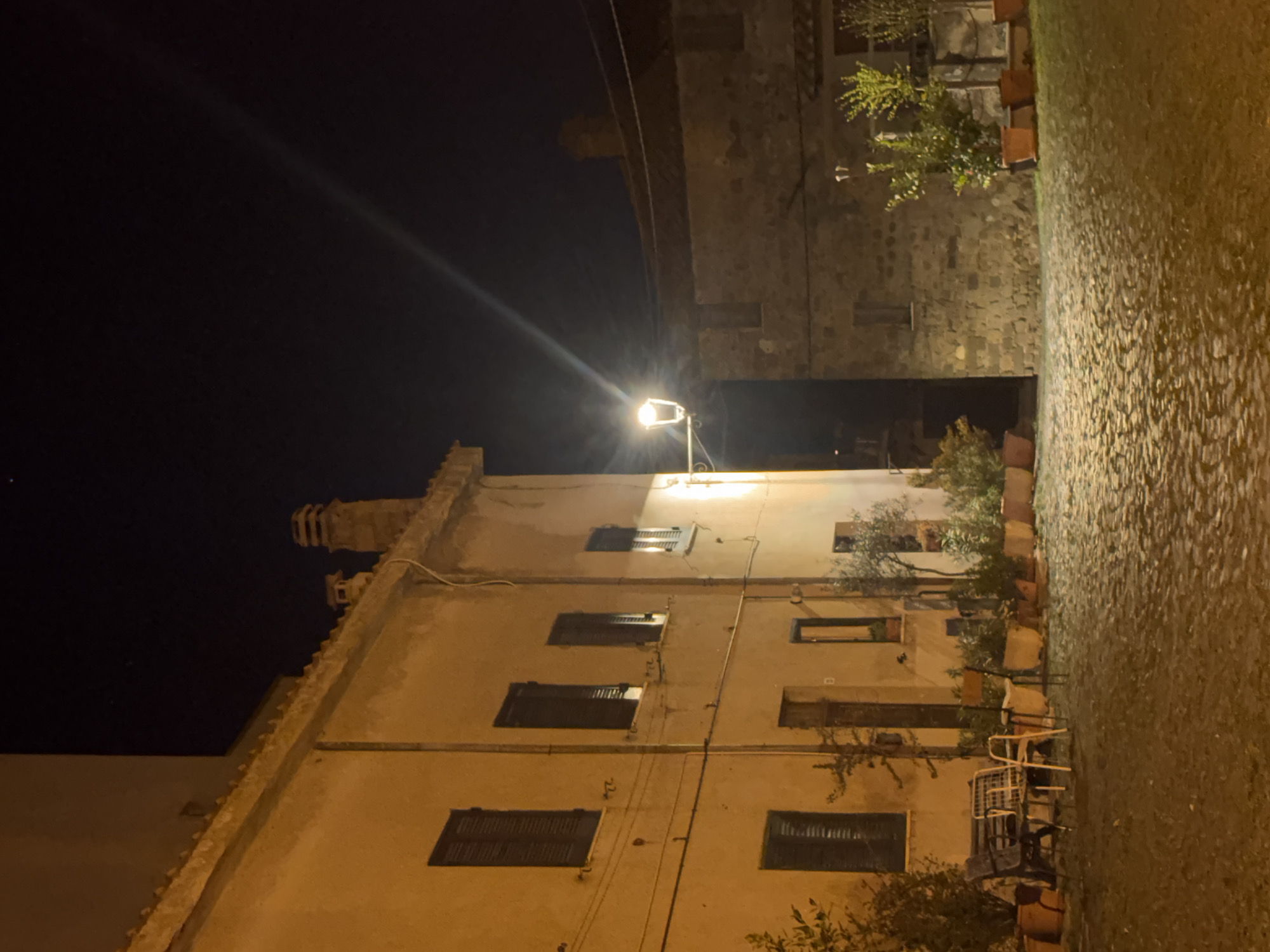 Evening stroll documented through historic Italian town streets