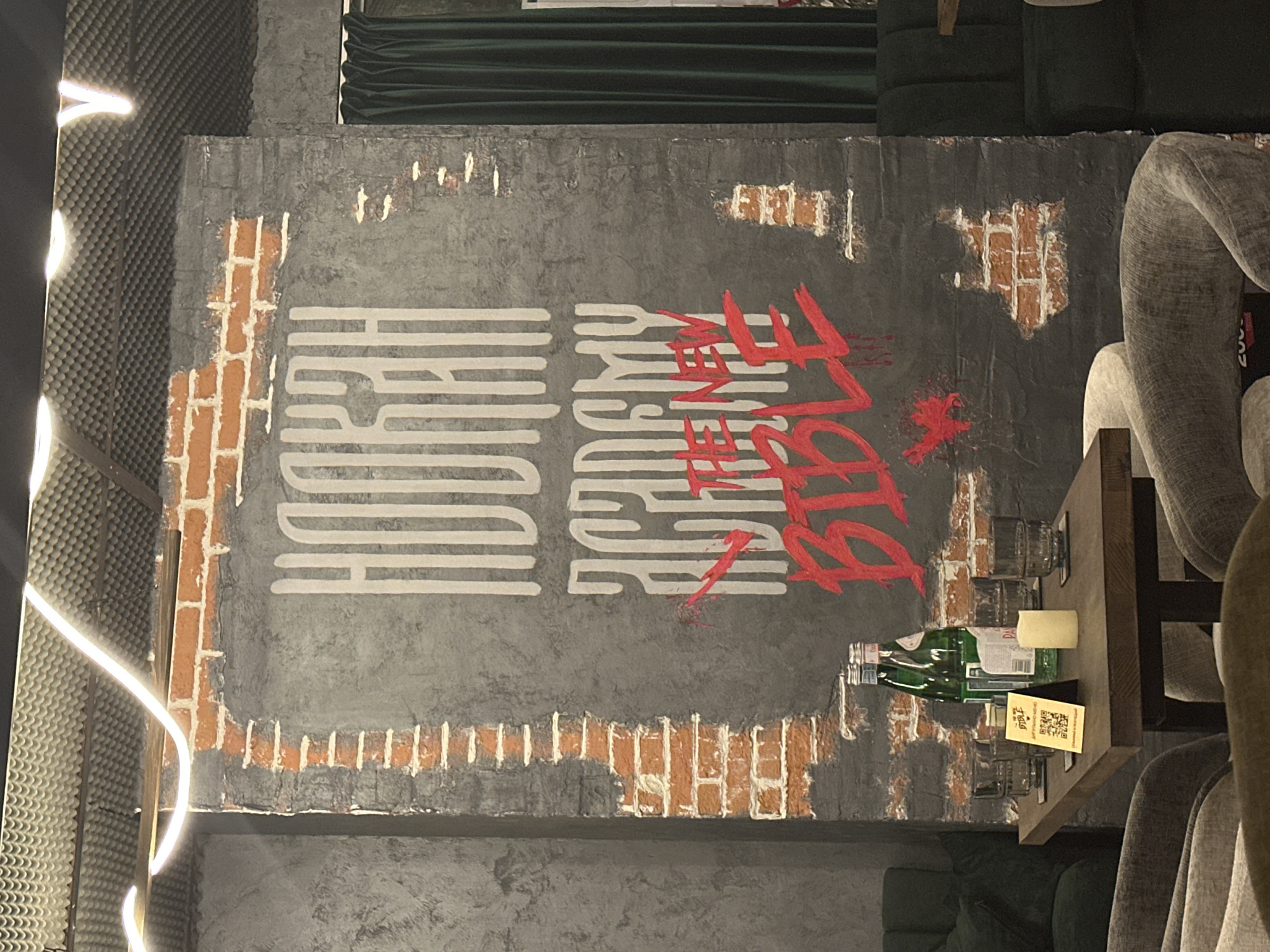 Graffiti art and nighttime patio scene documented at entertainment venue