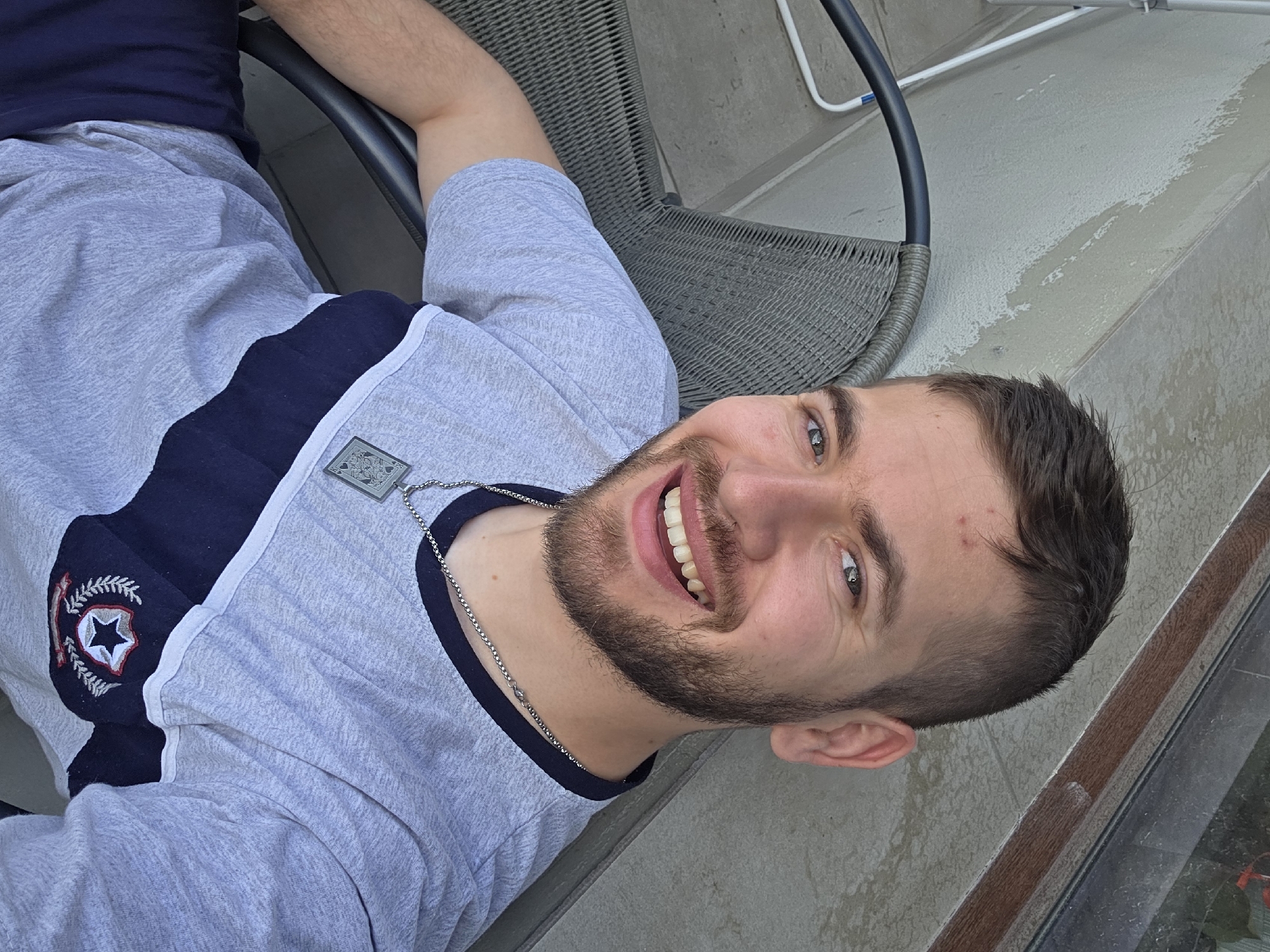 Man takes morning selfies on balcony in Bulgarian village