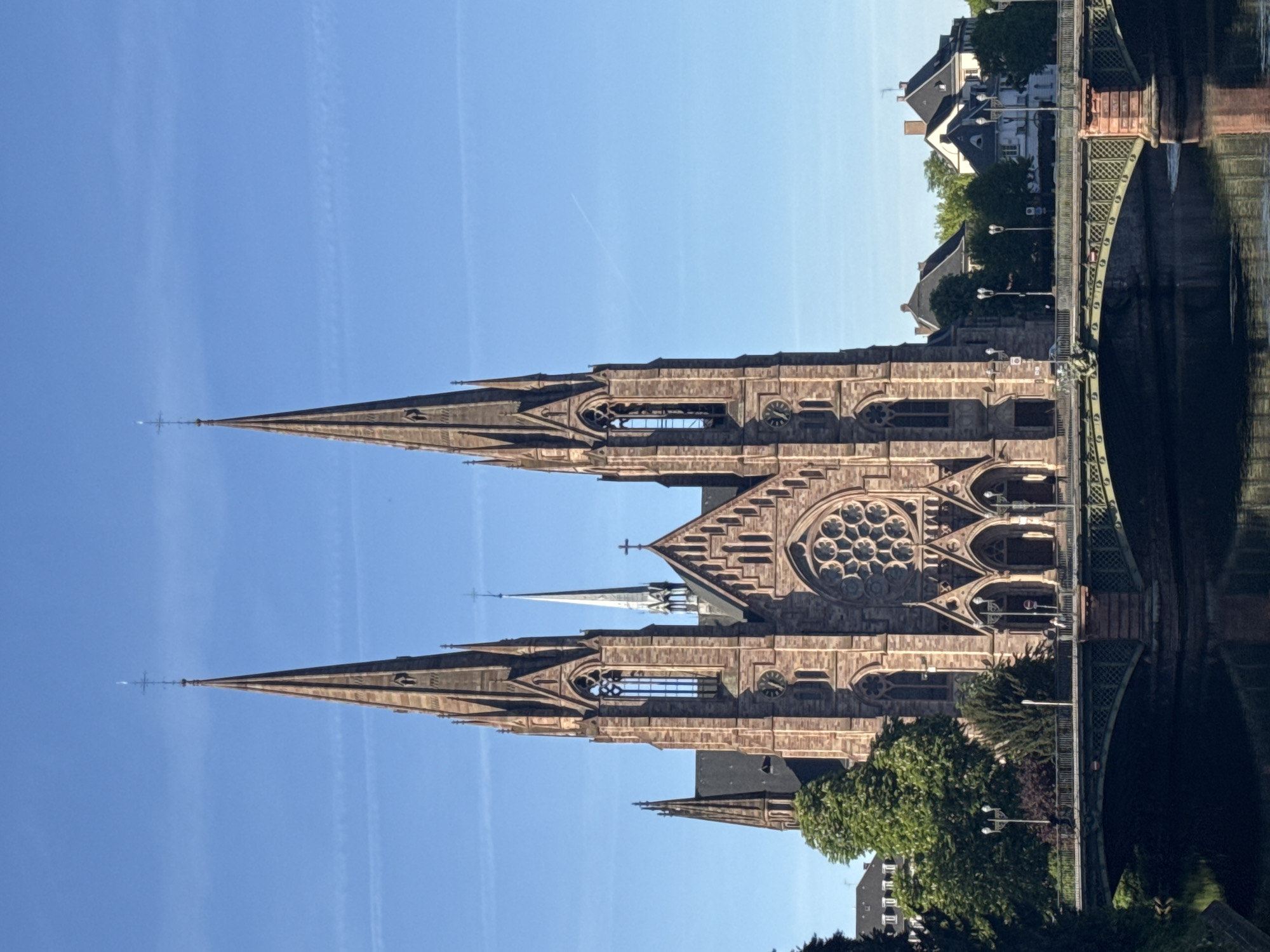 Gothic Revival church with twin spires observed in Strasbourg