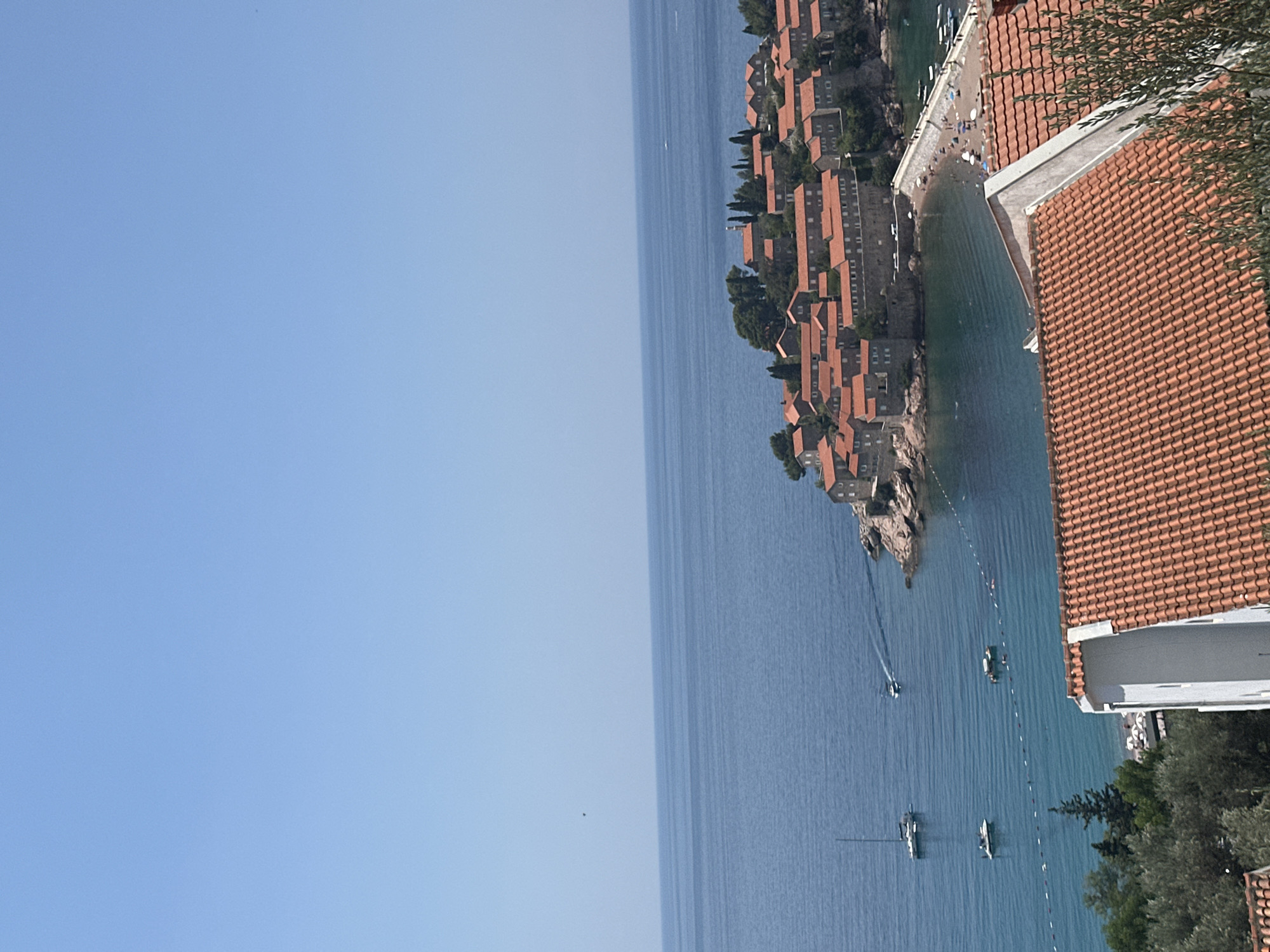 Sveti Stefan's fortified island and coastline from multiple viewpoints
