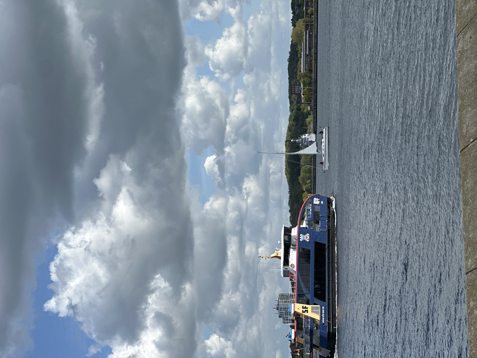 Ferry operates on Kiel Fjord during afternoon service
