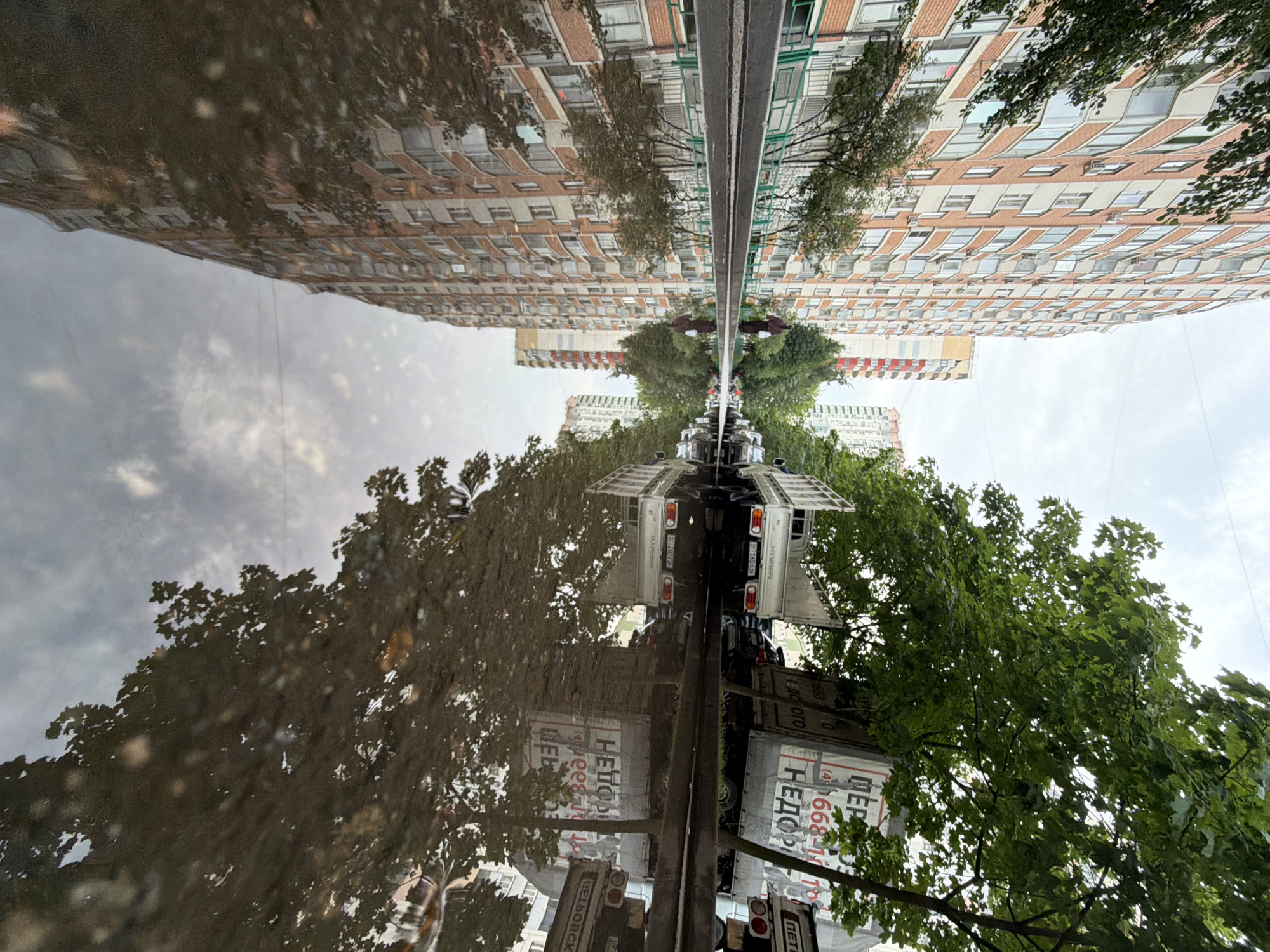 Khimki streets and buildings after a summer rain